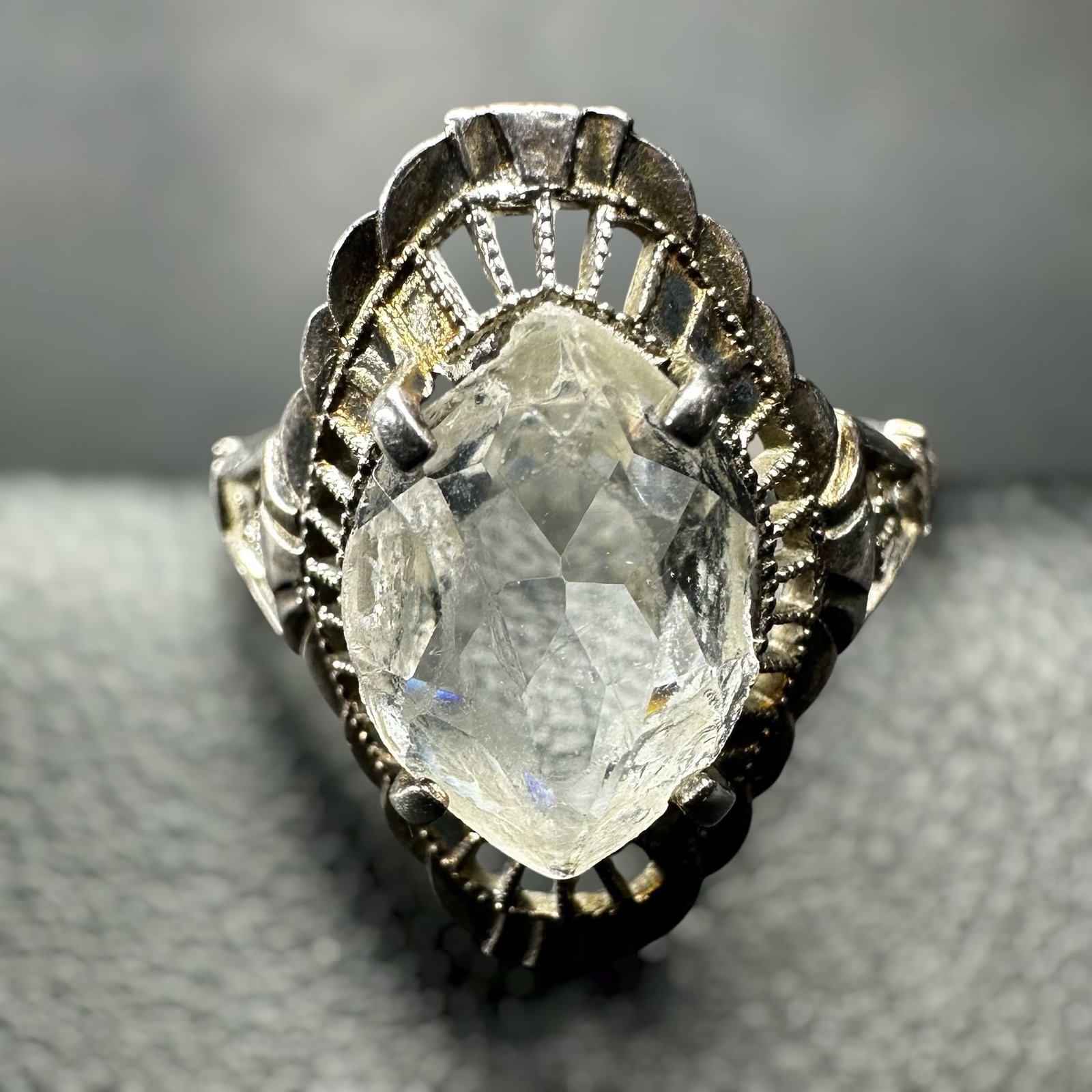 Sz4/2g Antique Sterling Silver Faceted Clear Stone Ring: Sz4/2g Sterling Silver Faceted Clear Stone RingBrand/Model: No hallmark.Manufacturer Location: Not marked.Year Produced: Unknown.Condition: Good condition with light surface wear and minor scratches c