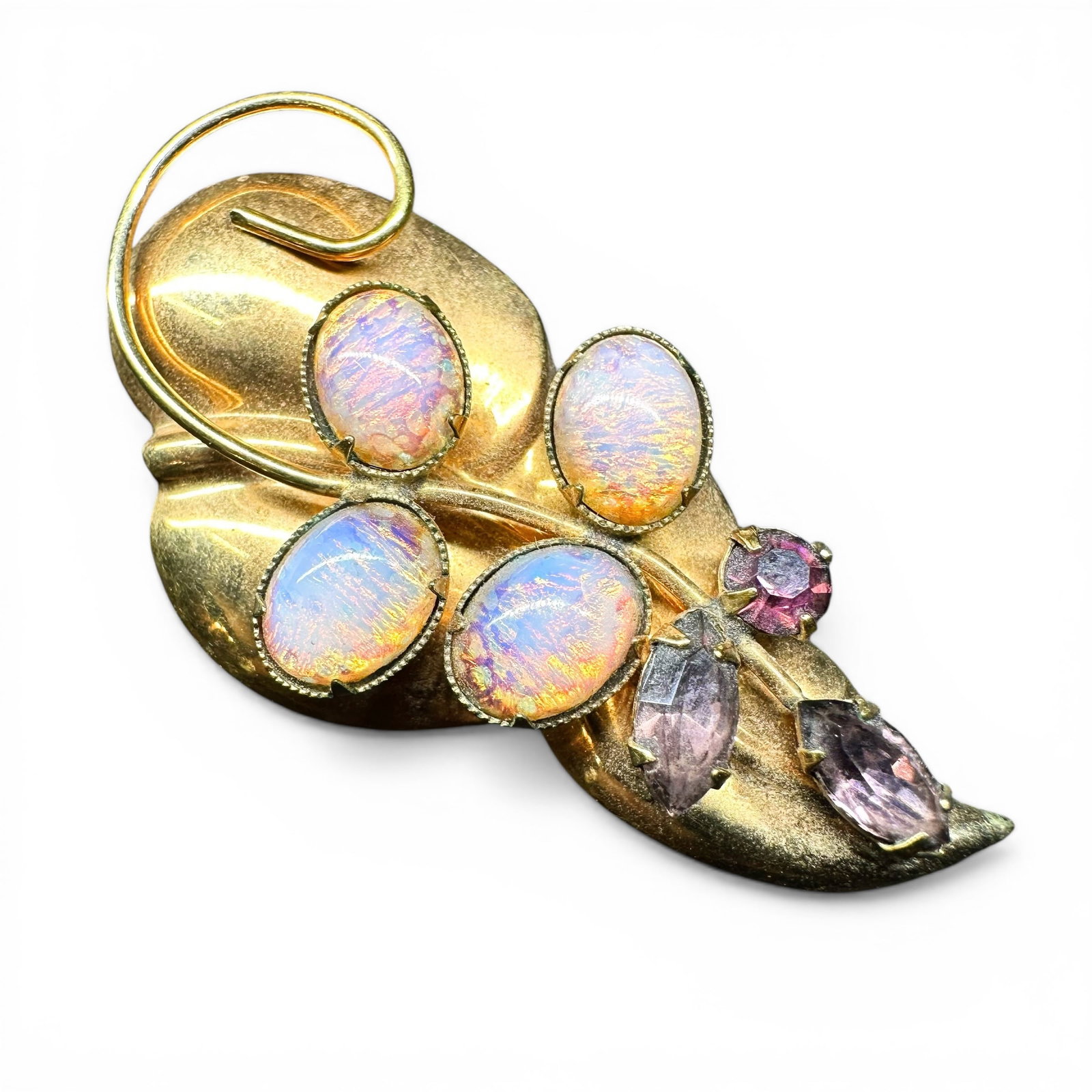 6g Gold Tone Opal Glass & Rhinestone Brooch: 6g Gold Tone Opal & Rhinestone BroochBrand/Model: No hallmark.Manufacturer Location: Not marked.Year Produced: Unknown.Condition: Good vintage condition with surface wear, light scratches, and minor f