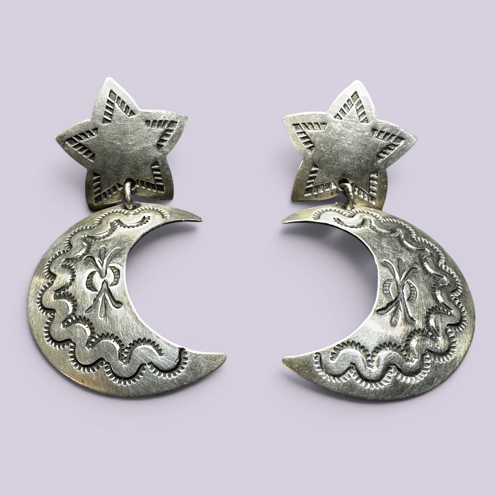 10g Navajo Agnes Secatero Stamped Sterling Silver Earrings: 10g Native American 10g Navajo Agnes Secatero Stamped Serling Silver Earrings:Brand/Model: Hallmarked, "A. Secatero." Navajo artisan; Agnes Secatero. Manufacturer Location: unmarkedYear Produced: Unkn