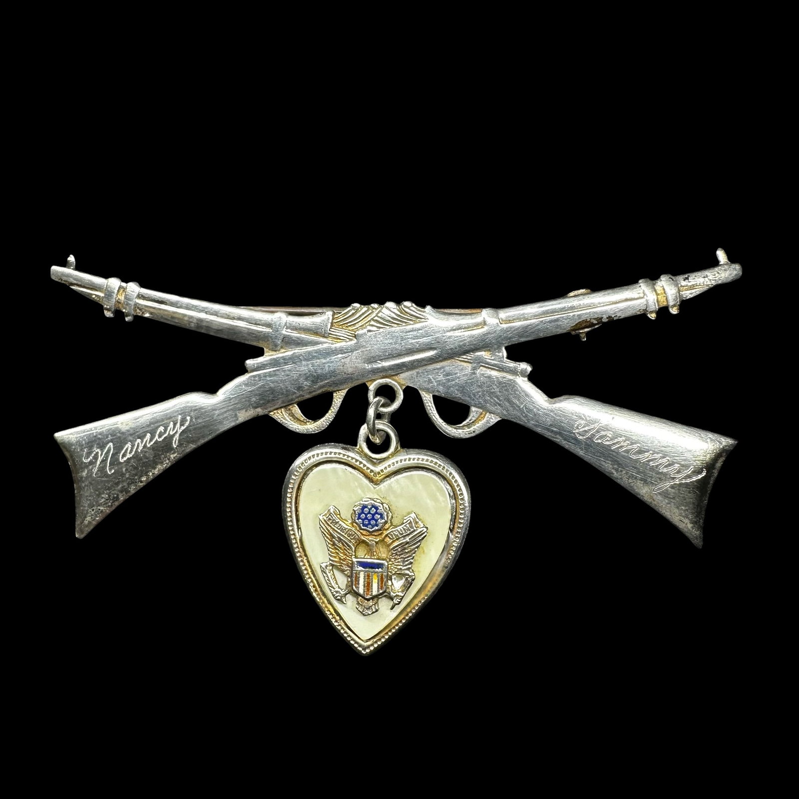 7g Vintage Engraved Sterling Silver Mother of Pearl Rifle Heart Brooch: 7g Vintage Sterling Silver Mother of Pearl Rifle Heart Brooch:Brand/Model: Engraved “Nancy” and “Sammy”.Manufacturer Location: unmarked.Year Produced: Unknown.Condition: Good condition