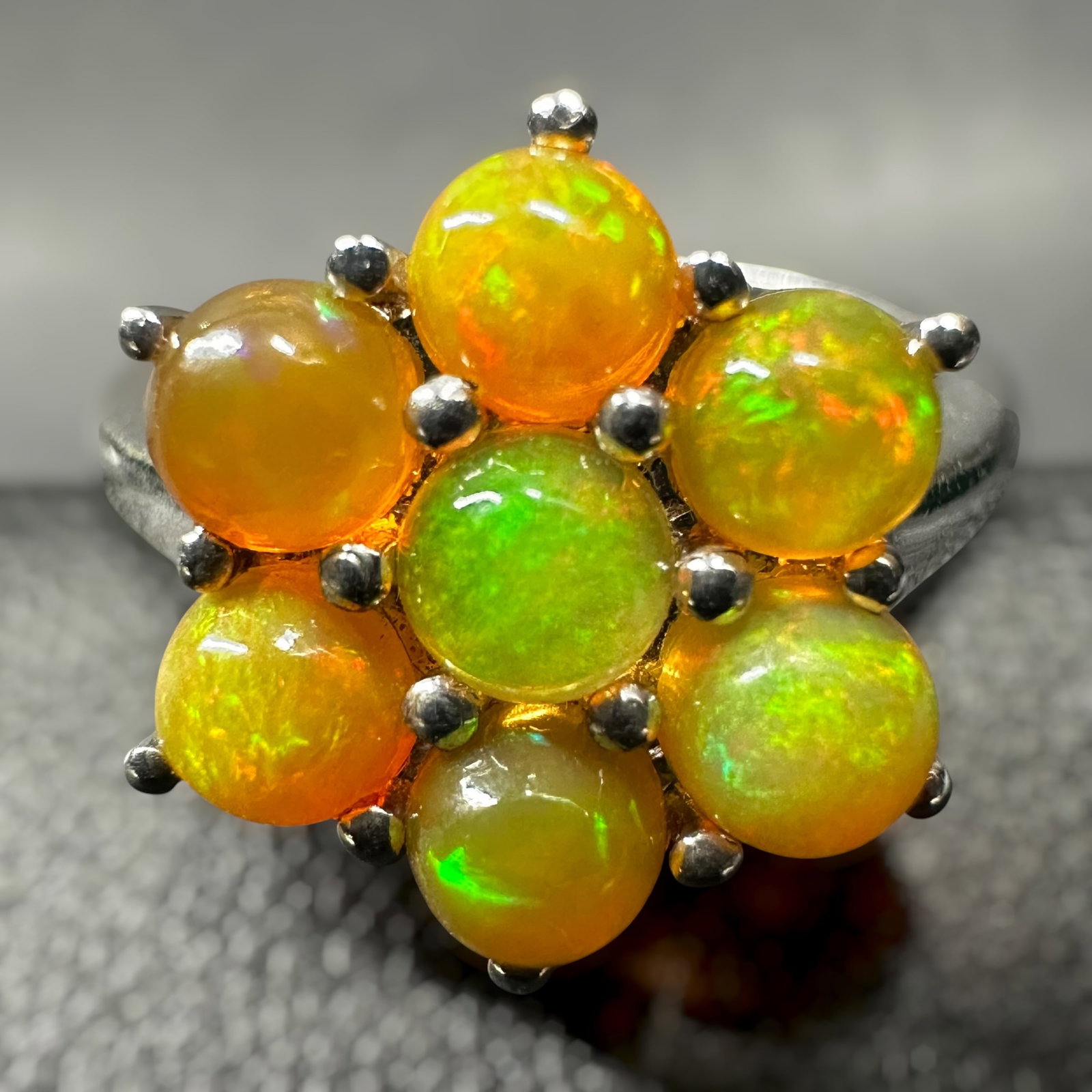 Sz6.5/3g 925 Sterling Silver Opal Cluster Ring: Sz6.5/3g 925 Sterling Silver Opal Cluster Ring:Brand/Model: Marked “925 TGC”.Manufacturer Location: Unmarked.Year Produced: Unknown.Condition: Good condition with light surface wear and minor 