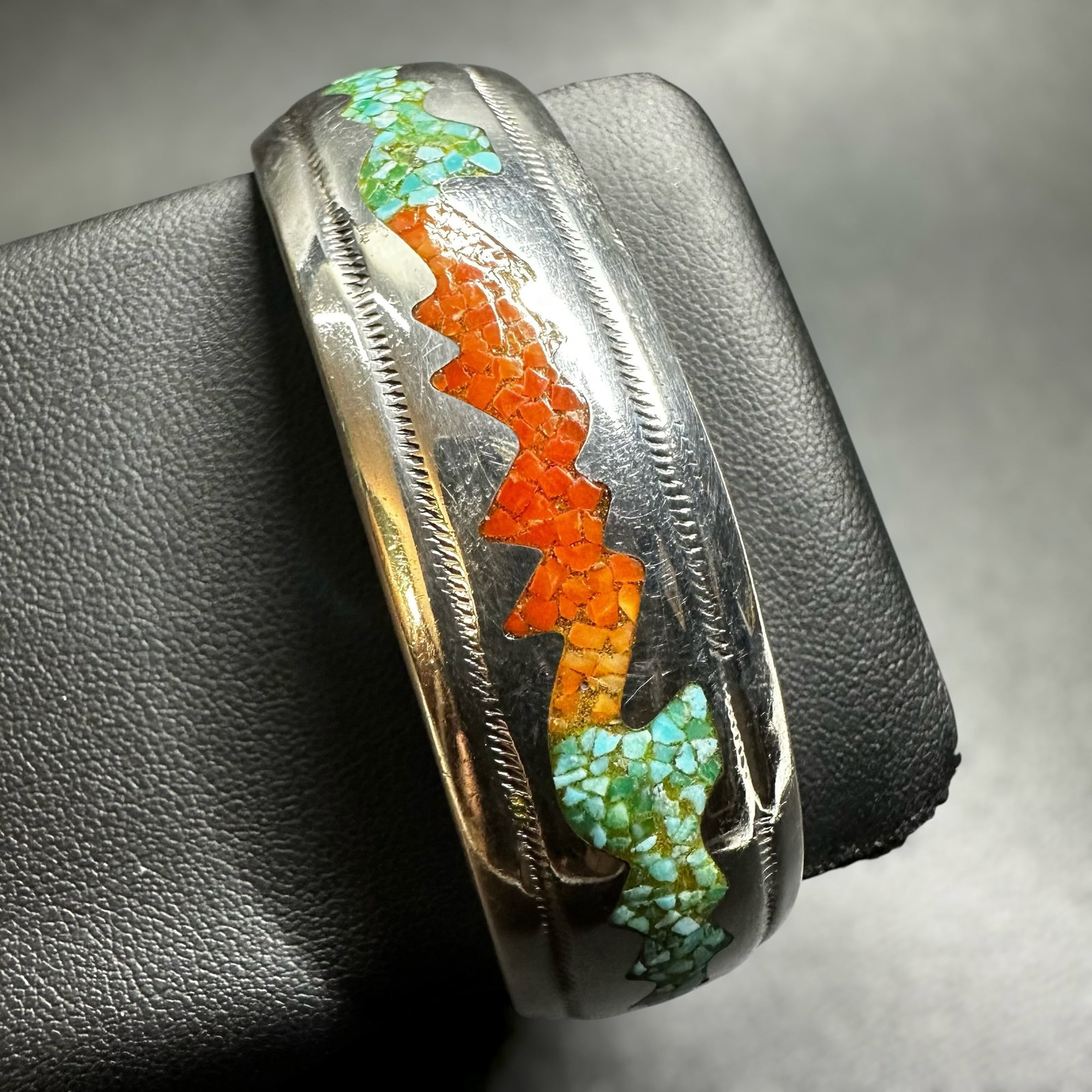 6.5”/47g Navajo Charlie John Sterling Silver Turquoise & Coral Chip Inlay Cuff: 6.5”/47g Navajo Charlie John Sterling Silver Turquoise & Coral Chip Inlay CuffBrand/Model: Hallmarked; “NAVAJO CJ” Charlie John, Navajo silversmith.Manufacturer Location: unmarked.Year P