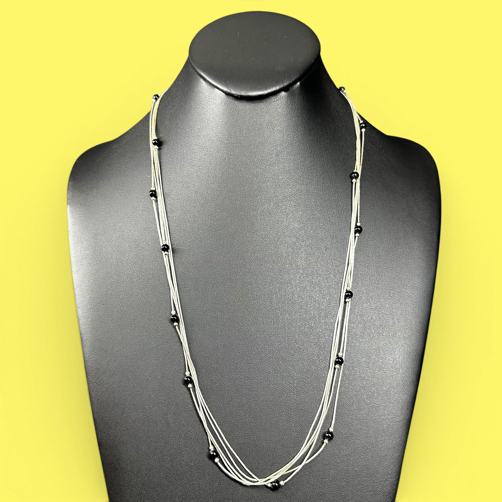 23”/10g Native American Liquid Sterling Silver & Black Onyx Bead Necklace: 23”/10g Native American Liquid Sterling Silver & Black Onyx Bead Necklace:Brand/Model: No hallmark.Manufacturer Location: Unmarked.Year Produced: Unknown.Condition: Good condition with light sur
