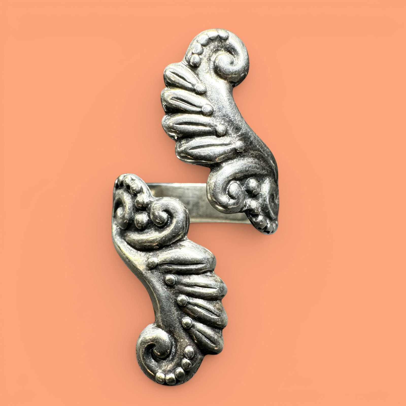 Sz7 Adjustable/8g 925 Sterling Silver Ring: Sz7 Adjustable/8g 925 Sterling Silver Feather RingBrand/Model: No hallmark.Manufacturer Location: Unmarked.Year Produced: Unknown.Condition: Good condition with light surface wear and tarnish consiste