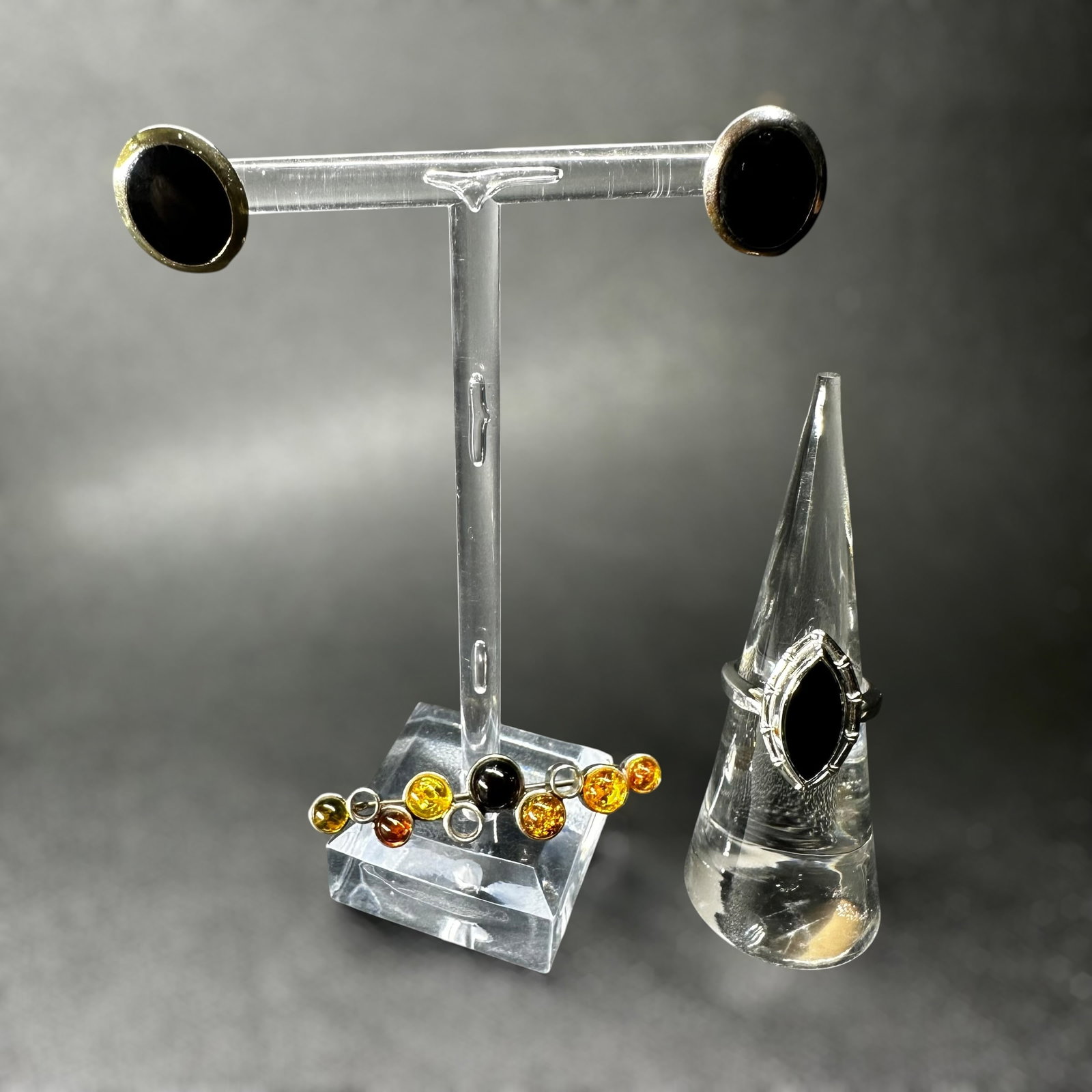 Sz5/9g 925 Sterling Silver Onyx Amber Jewelry Lot: Sz5/9g 925 Sterling Silver Onyx Amber Jewelry Lot:Brand/Model: Hallmarked “STERLING” and “925”; mixed styles.Manufacturer Location: Not marked.Year Produced: Unknown; likely late 20th 