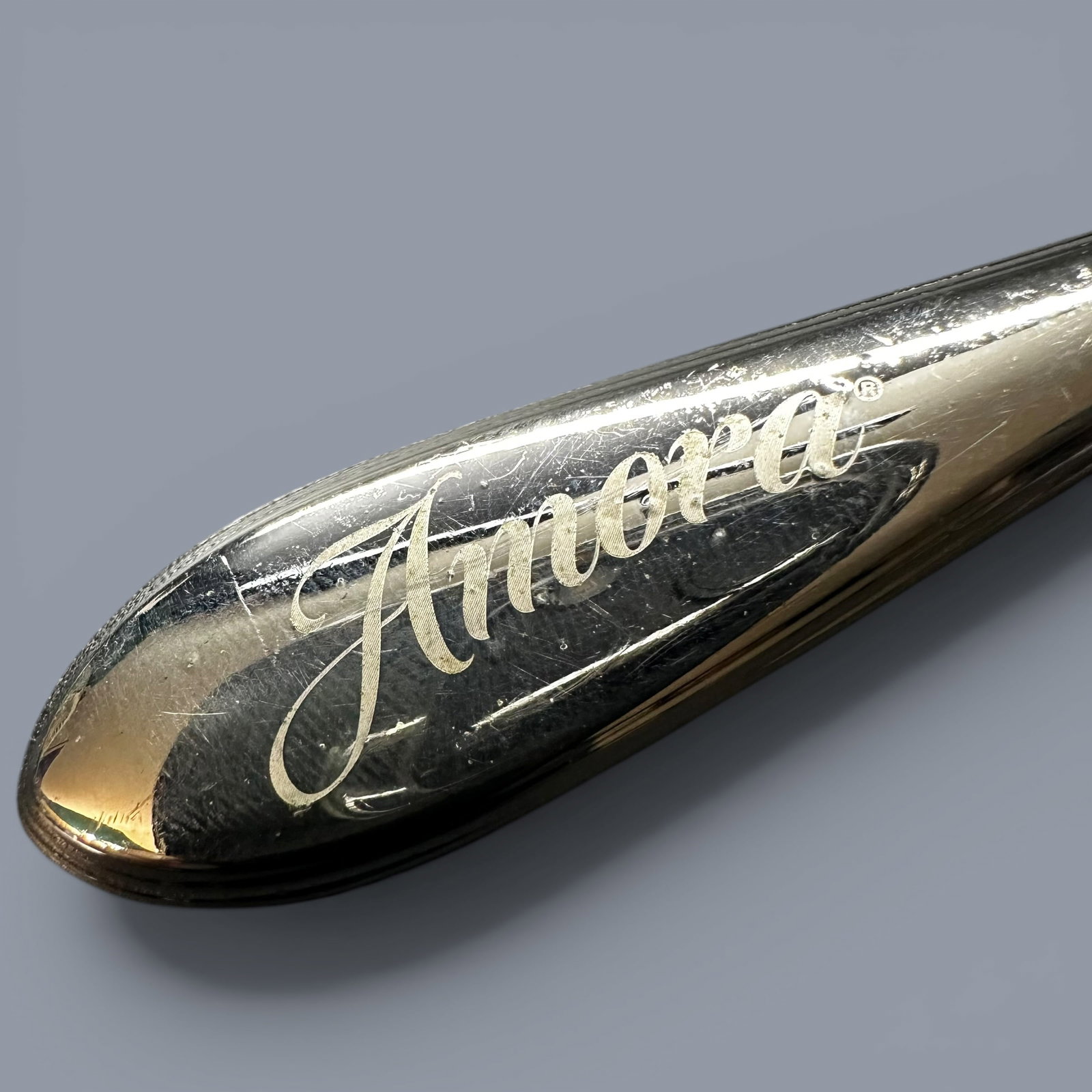 79g Amora Silver-Plated Coffee Scoop: 79g Amora Silver-Plated Coffee ScoopBrand/Model: Amora Coffee.Manufacturer Location: Unmarked.Year Produced: Unknown; likely mid to late 20th century.Condition: Good vintage condition with surface wea