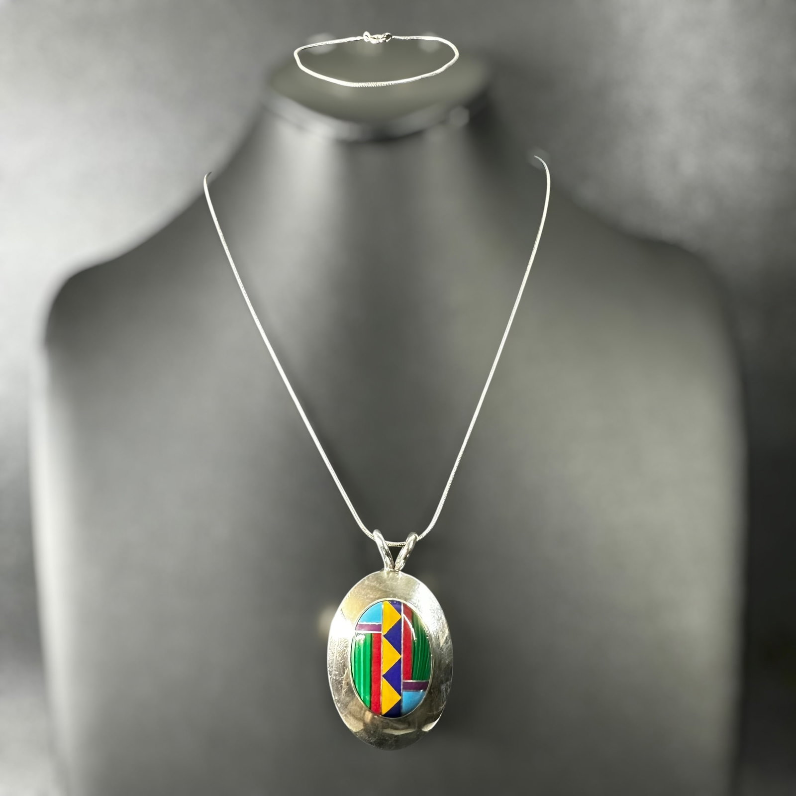 7.5"/17”/15g Sterling Silver Multi-Color Composite Inlay Pendant Necklace & Snake Chain: 7.5"/17”/15g Sterling Silver Multi-Color Composite Inlay Pendant Necklace & Snake Chain Bracelet:Brand/Model: No hallmark.Manufacturer Location: Unmarked.Year Produced: Unknown.Condition: Good c