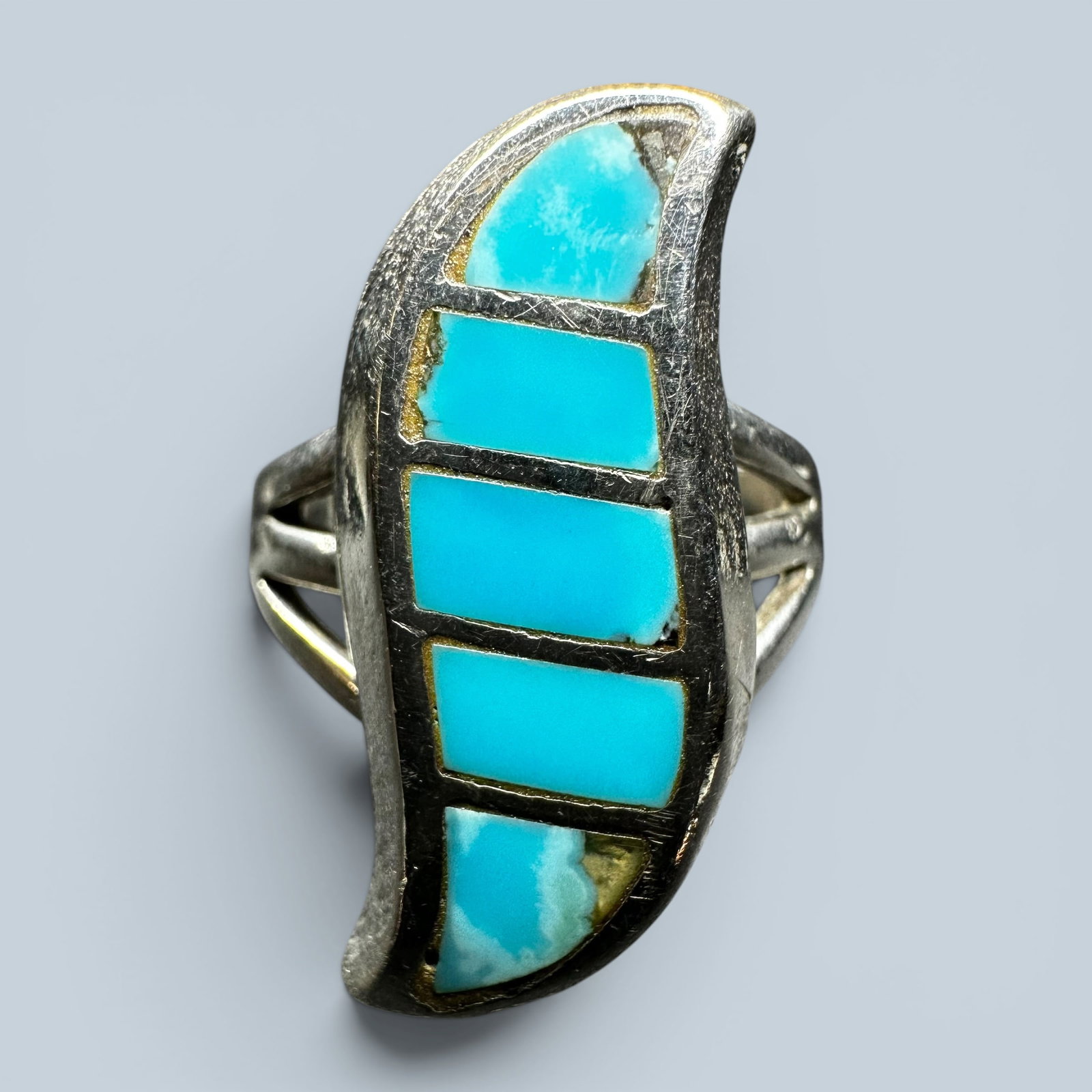 Sz6.75/6g Zuni Tilde Sterling Silver Sleeping Beauty Turquoise Inlay Ring: Sz6.5/6g Zuni Tilde Sterling Silver Sleeping Beauty Turquoise Inlay Ring:Brand/Model: No hallmark. Zuni “Tilde” ring.Manufacturer Location: Unmarked.Year Produced: Unknown.Condition: Good cond