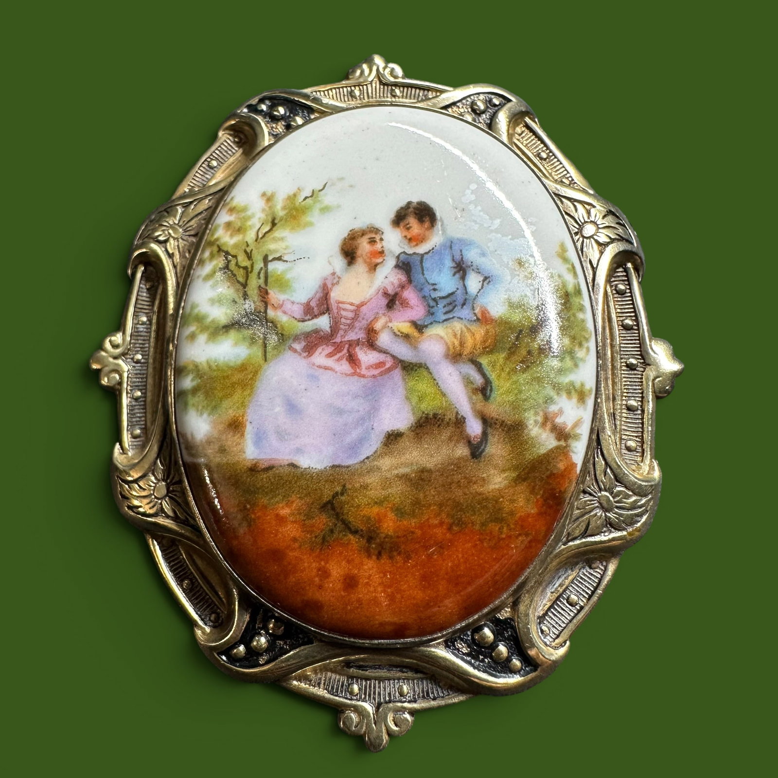 29g Victorian Porcelain Painted Transfer Rococo-Style "Fragonard Courting Couple" Brooch: 29g Victorian Porcelain Painted Transfer Rococo-Style "Fragonard Courting Couple" Brooch:Brand/Model: No hallmark. Patented clasp marked “PAT. 206696.”Manufacturer Location: Unknown.Year Produ