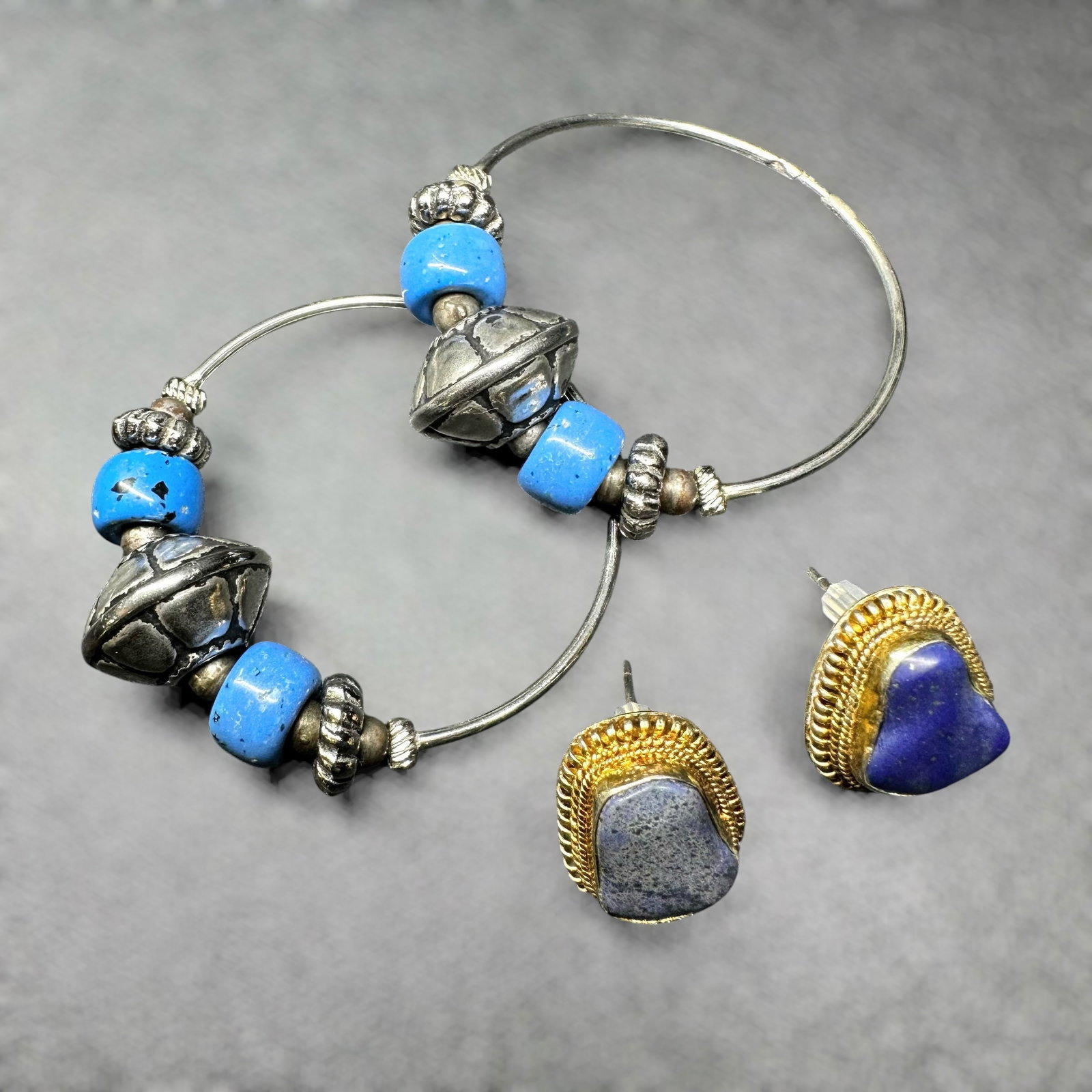 12g Taxco Mexico 925 Sterling Silver Lapis Stud Earrings & Blue Bead Silver Tone Hoops Lot: 12g Taxco Mexico 925 Sterling Silver Lapis Stud Earrings & Blue Bead Silver Tone Hoops Lot:Brand/Model: Hallmarked; "WAG 1994 MMA S925" Manufacturer Location: Not marked.Year Produced: Marked 1994.Con
