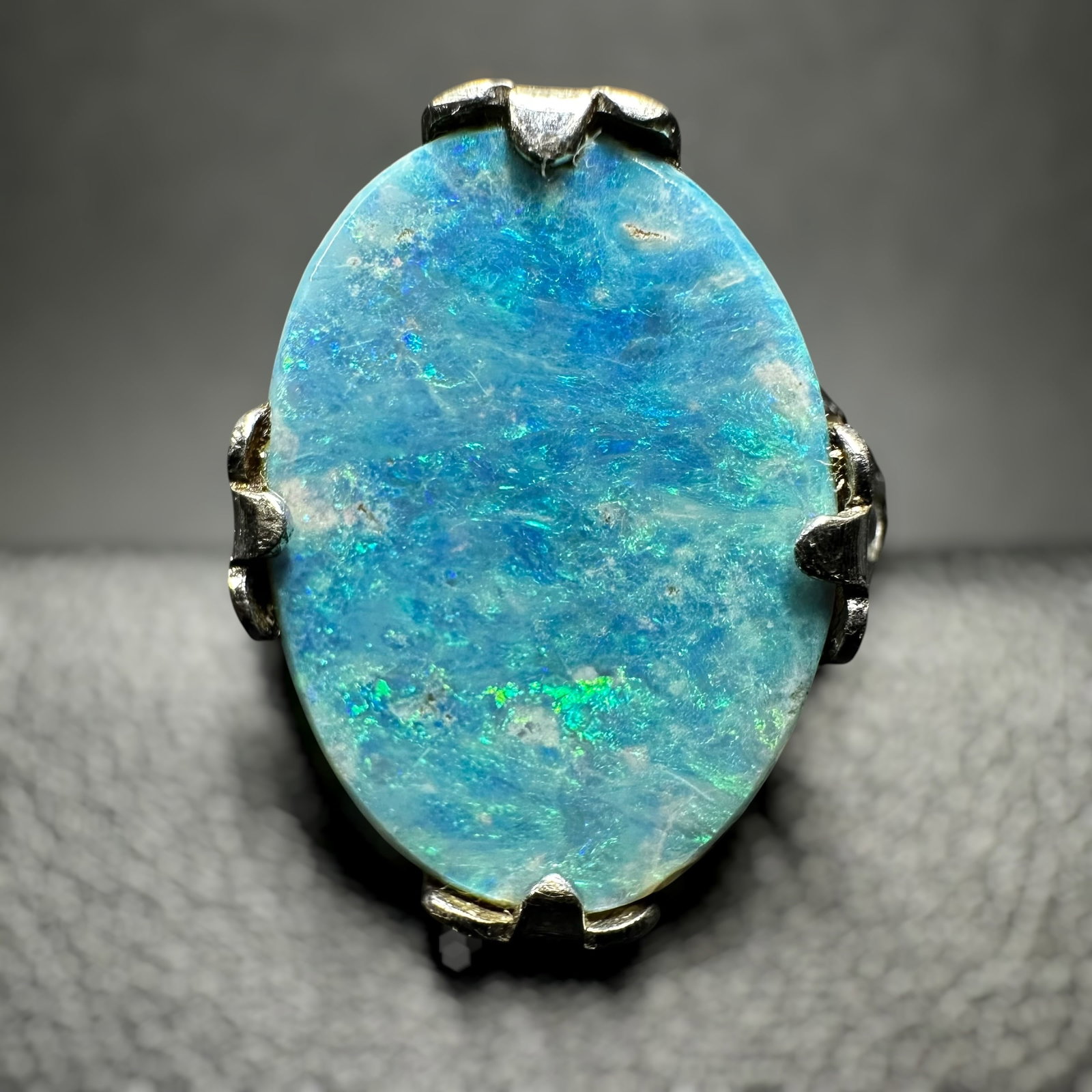 Sz6.75/3g Sterling Silver Blue Opal Ring: Sz6.75/3g Sterling Silver Blue Opal RingBrand/Model: Hallmarked; “STERLING.”Manufacturer Location: Unmarked.Year Produced: Unknown.Condition: Good vintage condition with surface wear, patina, 