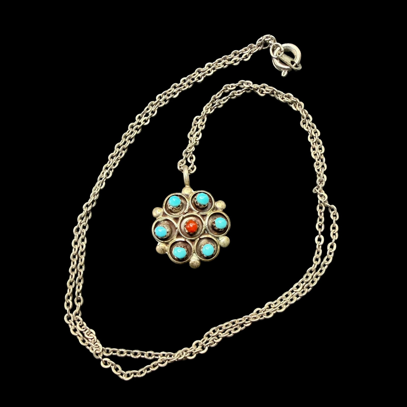 Vintage Old Pawn Native American Sterling Silver Turquoise Coral Necklace 17” 3.0g 925: Maker: Unmarked, likely Old Pawn. / Material: Sterling Silver. / Stone: Turquoise and Coral. / Size: 5/8” diameter. 17” chain overall. / Weight: 3.00 grams. / Condition: Excellent, ready t