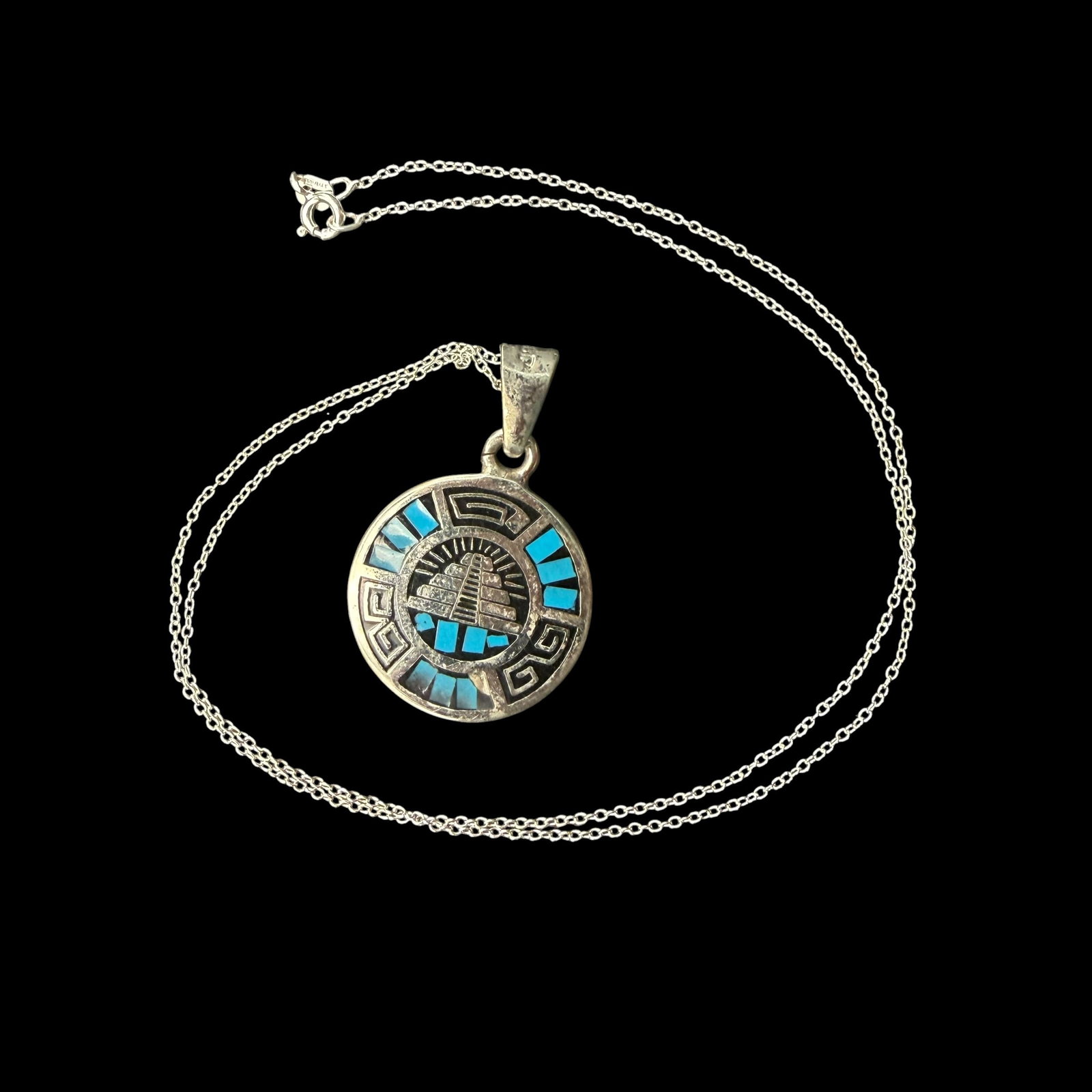 Vintage Sterling Silver Mexico Mayan Pyramid Calendar Necklace Pendant & Chain 11.12g 925: Maker: Marked Mexico on loop. / Material: Sterling Silver. / Stone: Unknown, guessing enamel. / Size: 1” diameter. 19.5” chain. / Weight: 11.12 grams combined. / Condition: Ready to wear a