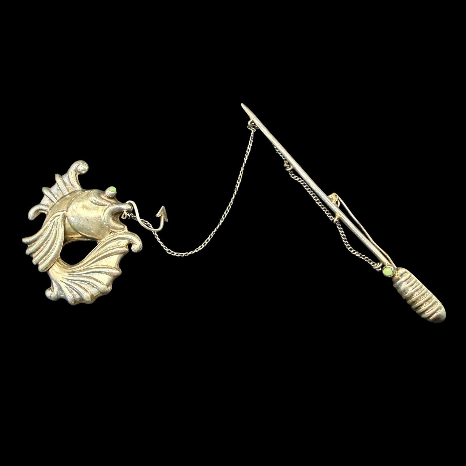 Vintage Sterling Silver Turquoise Mexico Fishing Rod Reel Fish Brooch Pins Pair 17.78g 925: Maker: Marked Mexico. / Material: Sterling Silver. / Stone: Turquoise. / Size: Fish measures 1 7/8” x 1 5/8”. Rod measures 3 7/8” long not including the chain. / Weight: 17.78 grams 