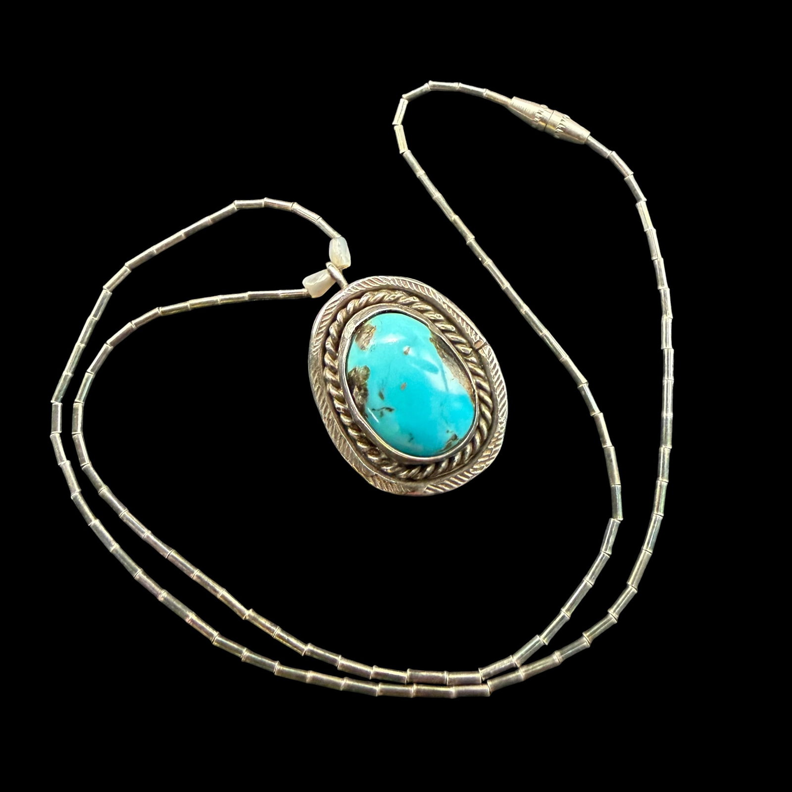 Vintage Sterling Silver Turquoise Native American Old Pawn Necklace Pendant Liquid Chain 8.12g 925: Maker: Unmarked, likely Old Pawn. / Material: Sterling Silver. / Stone: Turquoise. / Size: 1” x 13/16”. Chain measures 14.5” overall. / Weight: 8.12 grams combined. / Condition: Exce