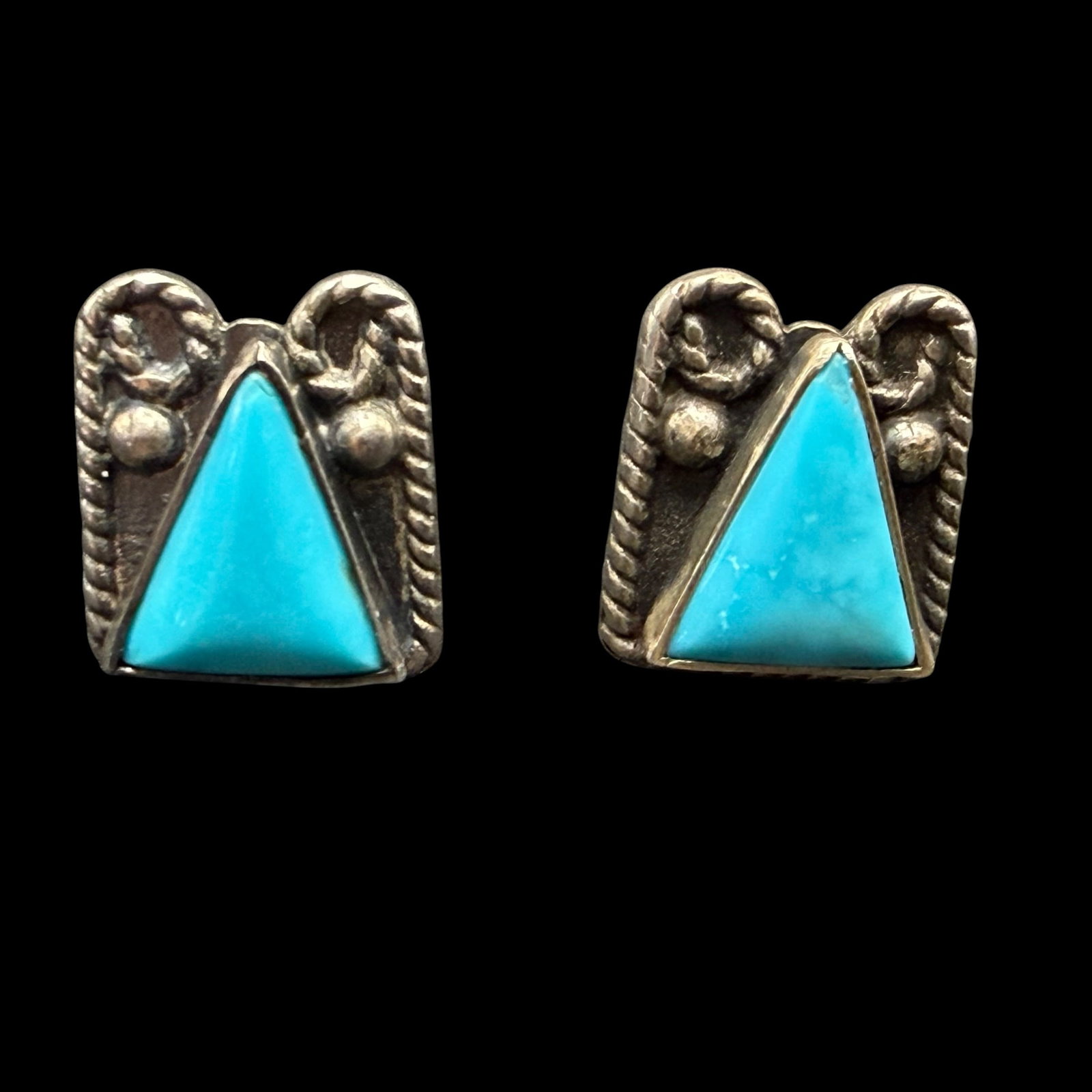 Vintage Native American Old Pawn Sterling Silver Turquoise Earrings 1/2” 3.75g 925: Maker: Unmarked, likely Old Pawn. / Material: Sterling Silver. / Stone: Turquoise. / Size: 1/2” x 3/8” each. / Weight: 3.75 grams combined. / Condition: Excellent, ready to enjoy. / Sold a