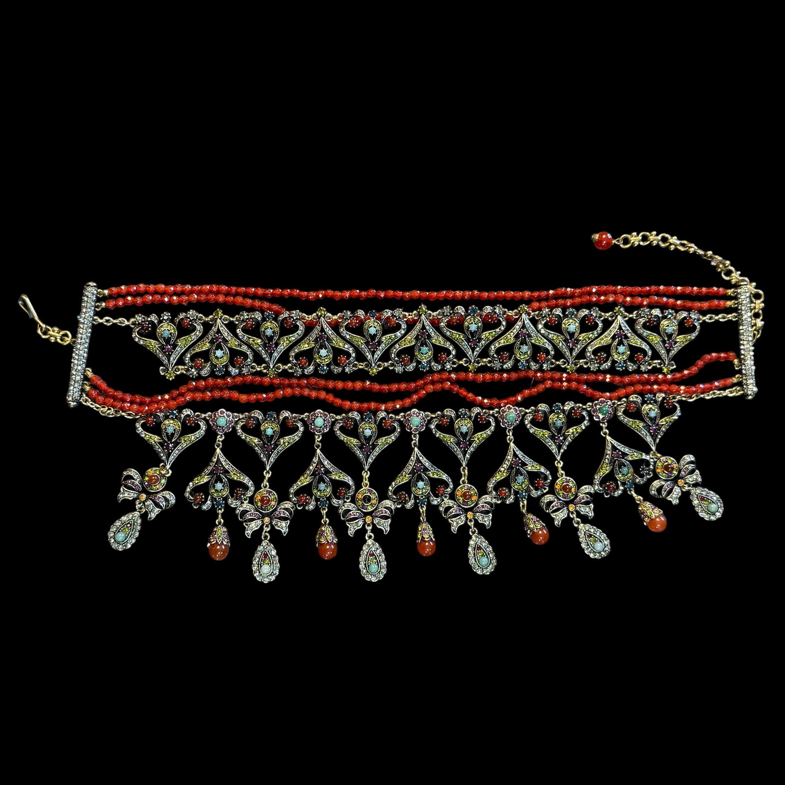 Vintage Gold Tone Glass Stones Belly Dancer Choker Necklace 17” Long Heidi Daus: Maker: Marked Heidi Daus, China. / Material: Gold Tone base metal. / Stone: Multi Color Stones, Glass beads. Unknown. / Size: 17” Long.. / Condition: Ready to enjoy. Please note there is one red
