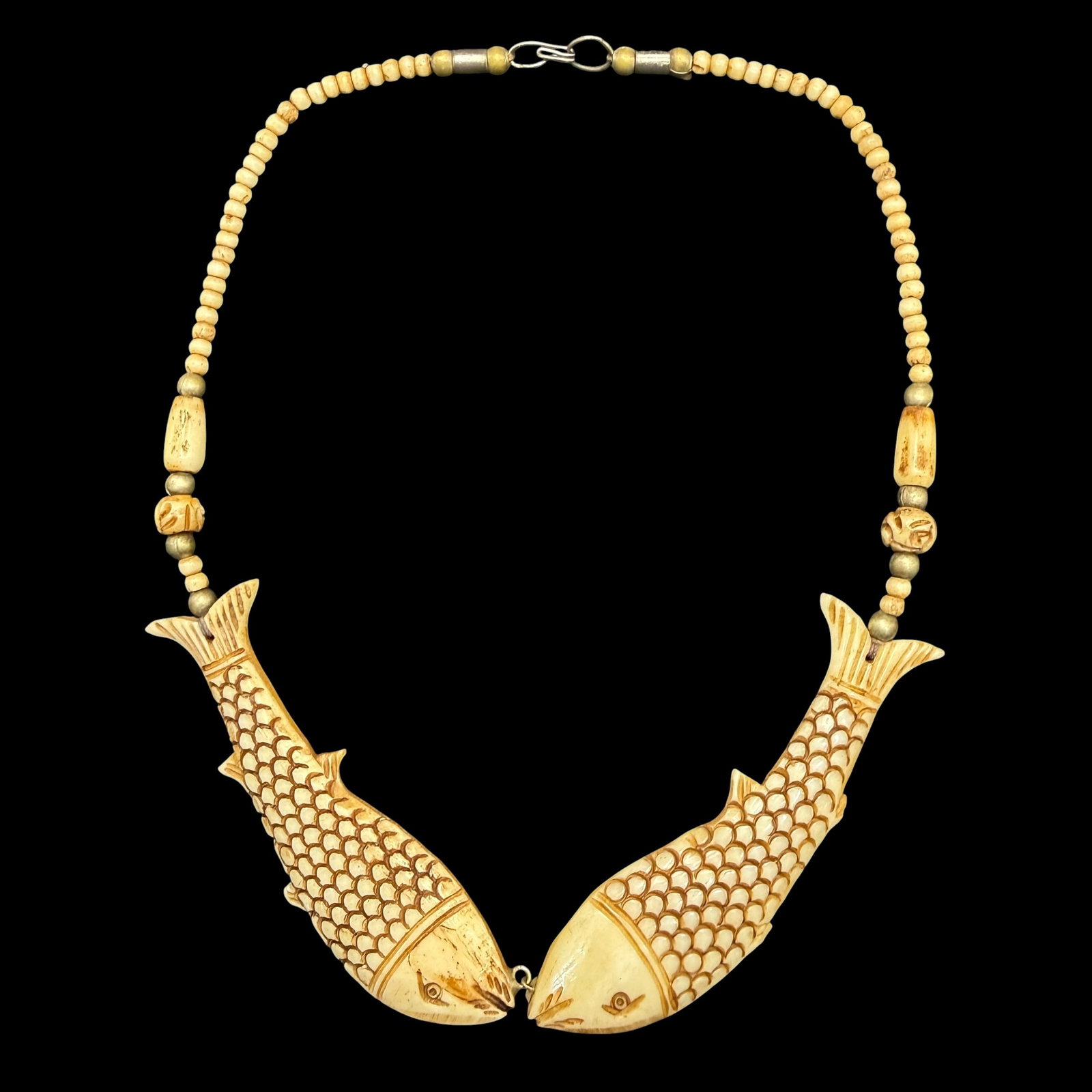 Antique Hand Carved Bone Fish Beaded Necklace 17.5” Long: Maker: Unmarked, unknown. / Material: Hand carved bone with a few metal beads. / Size: 17 1/2” long overall. Each fish is roughly 3 3/8” x 15/16”. / Condition: Excellent, ready to en