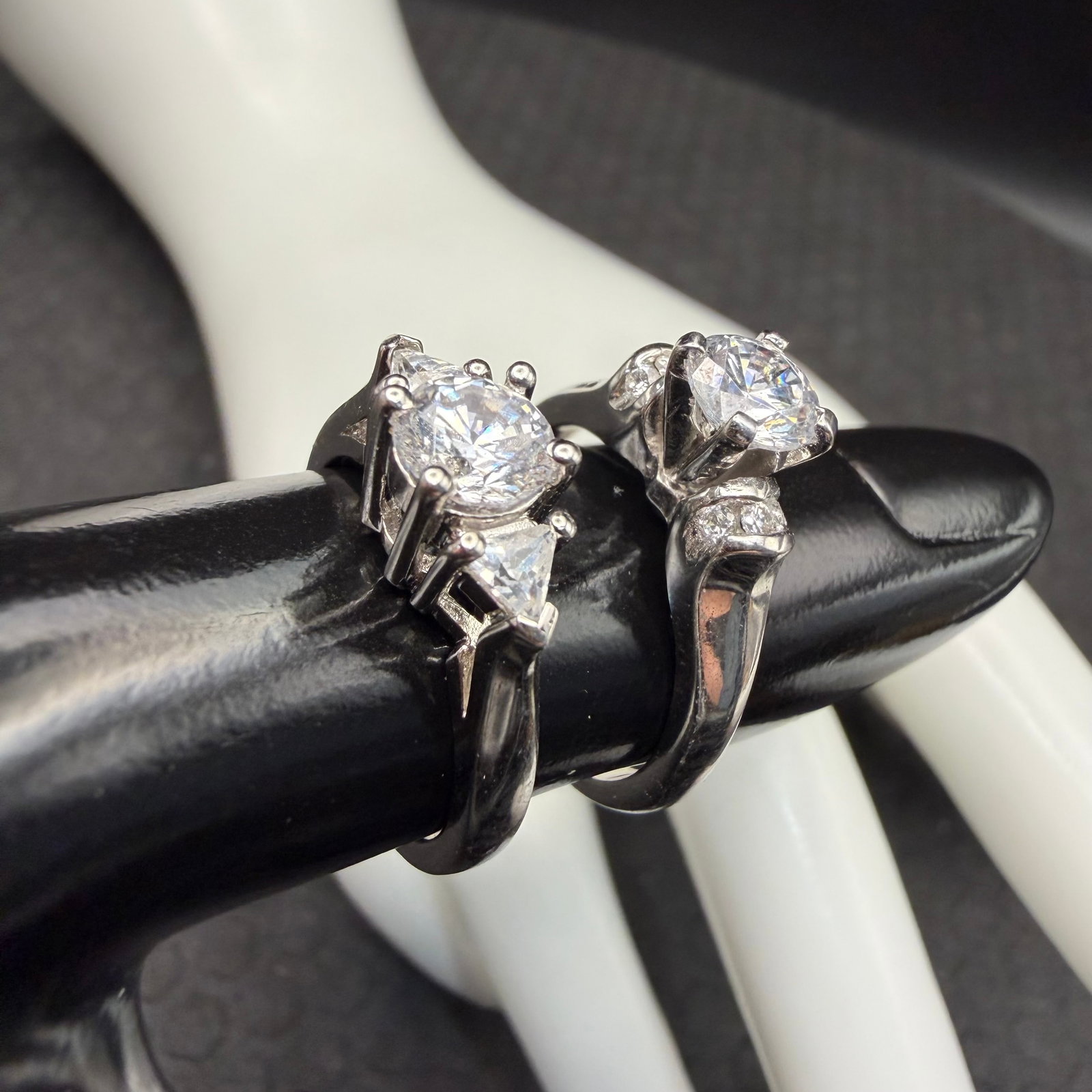 2 Sterling Silver CZ Engagement Rings Cubic Zirconia VG Sz 7 7.25 8.35g 925 New: Maker: Marked VG. / Material: Sterling Silver. / Stone: CZ, Cubic Zirconia. / Size: 7 and 7.25. / Weight: 8.35 grams combined. / Condition: Excellent! Ready to enjoy! / Sold as is. Measurements are ap