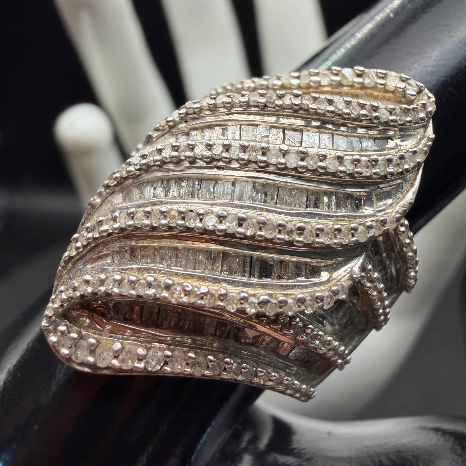 Vintage Sterling Silver Swirl Diamond Cocktail Ring Sz 8 10.21g 925 SJ: Maker: Marked SJ, unknown. / Material: Sterling Silver. / Stone: Untested Diamonds. / Size: 8. Face measures 1 1/8” wide. / Weight: 10.21 grams. / Condition: Great. Ready to enjoy. / Sold as is.