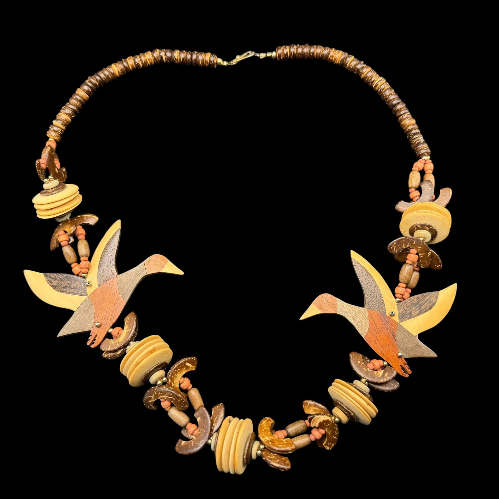 Vintage Carved Wood Bead Duck Boho Necklace 27” Long: Maker: Unmarked. / Material: Wood. Several different types. / Size: 27” Long overall. / Condition: Great and ready to enjoy. / Sold as is. Measurements are approximate. Please see all photos as 