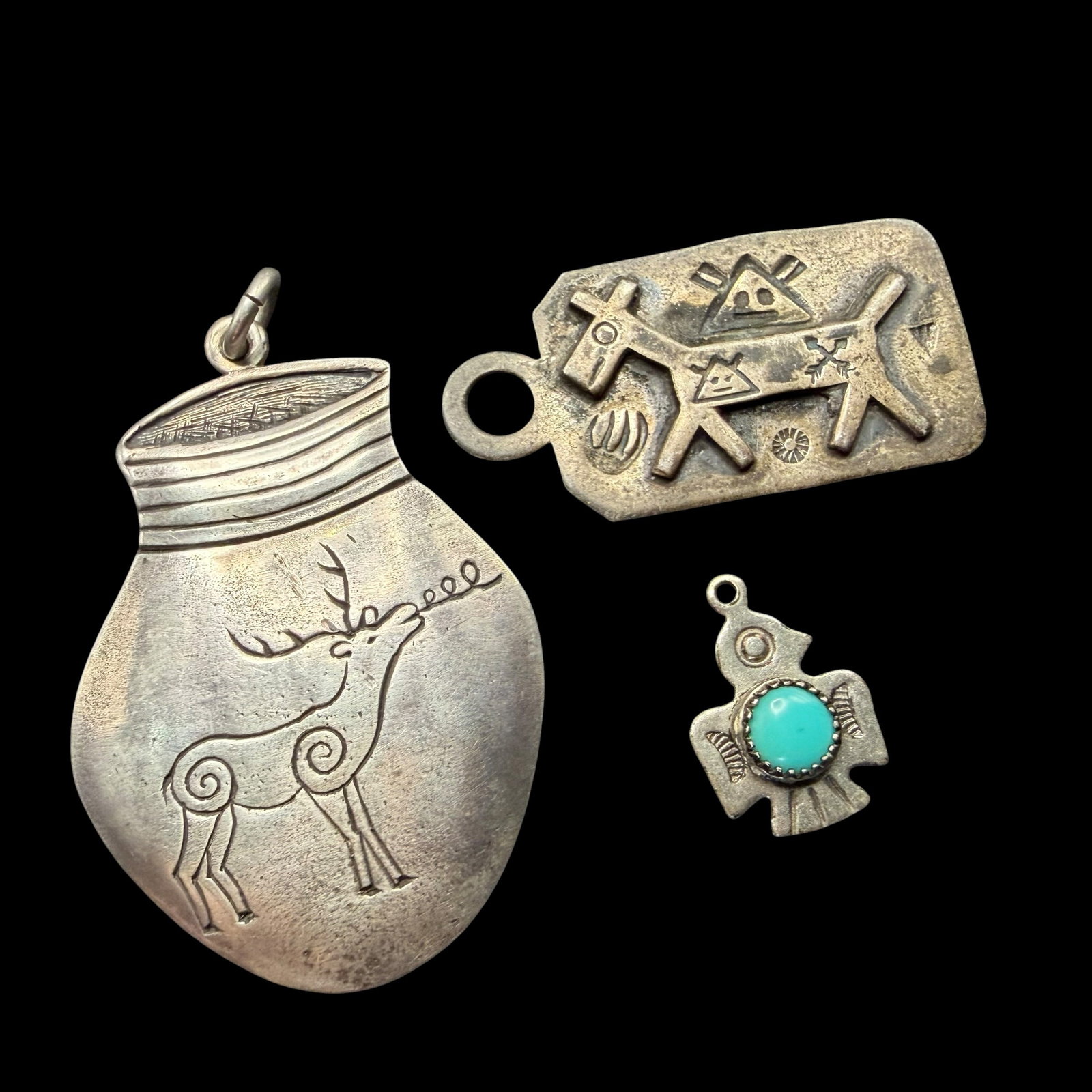 Three Vintage Sterling Silver Native American Navajo Hopi Necklace Pendants 12.11g 925 WRS Old Pawn: Maker: Largest marked WRS. Other 2 unmarked, possibly Old Pawn. / Material: Sterling Silver. / Stone: Turquoise. / Size: Pot 1 5/8” x 1 1/8”. Animal 1 1/4” x 5/8”. Eagle 5/8&rd