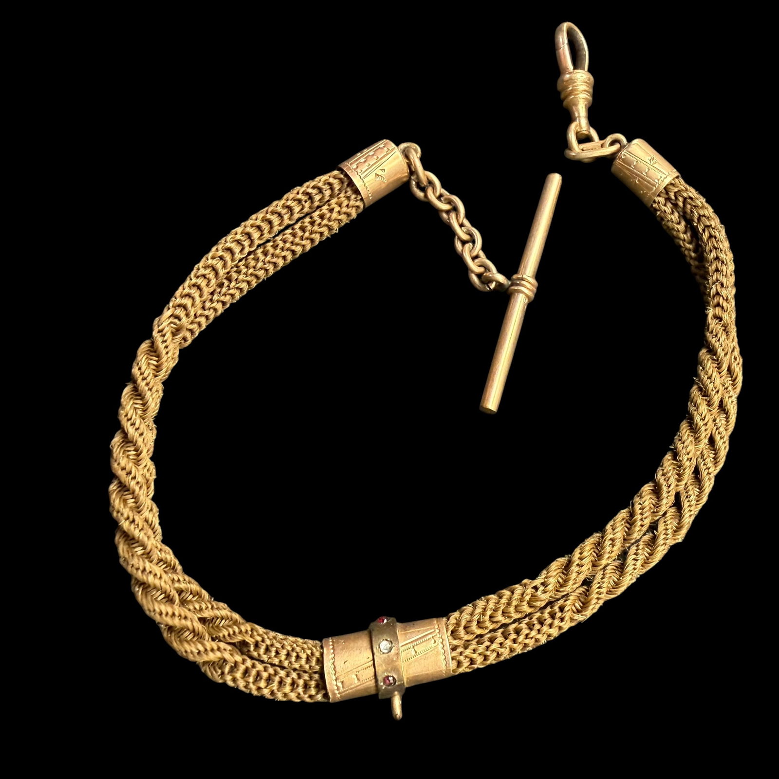 Vintage Antique Human Hair Mourning Watch Chain Fob Chain Woven 1/10 Gold Filled 10.75” 10.37g: Maker: Unmarked, Unknown. Material: Human Hair, 1/10 GF Gold Filled. / Stone: Small red and white stones in center piece. Unknown. / Size: 10 3/4” long. / Weight: 10.37 grams overall. / Conditio