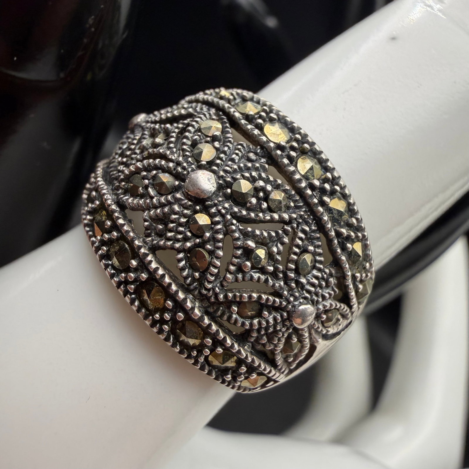 Vintage Sterling Silver Marcasite Wide Band Cocktail Ring Sz 7 6.48g 925 Signed: Maker: Mark Shown, unknown. / Material: Sterling Silver. / Stone: CZ, Cubic Zirconia. / Size: 7. / Weight: 6.48 grams. / Condition: Great, ready to enjoy! / Sold as is. Measurements are approximate. P