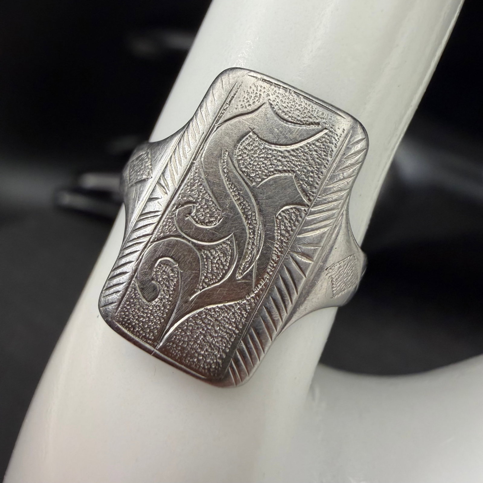 Vintage Steel WWII Era F Initial Engraved Ring Sz 7.75 Possible Trench Art: Maker: Unmarked, unknown. / Material: Likely steel. / Stone: None. / Size: 7.75. Face measures 11/16” long. / Condition: Great, ready to enjoy! / Sold as is. Measurements are approximate. Please