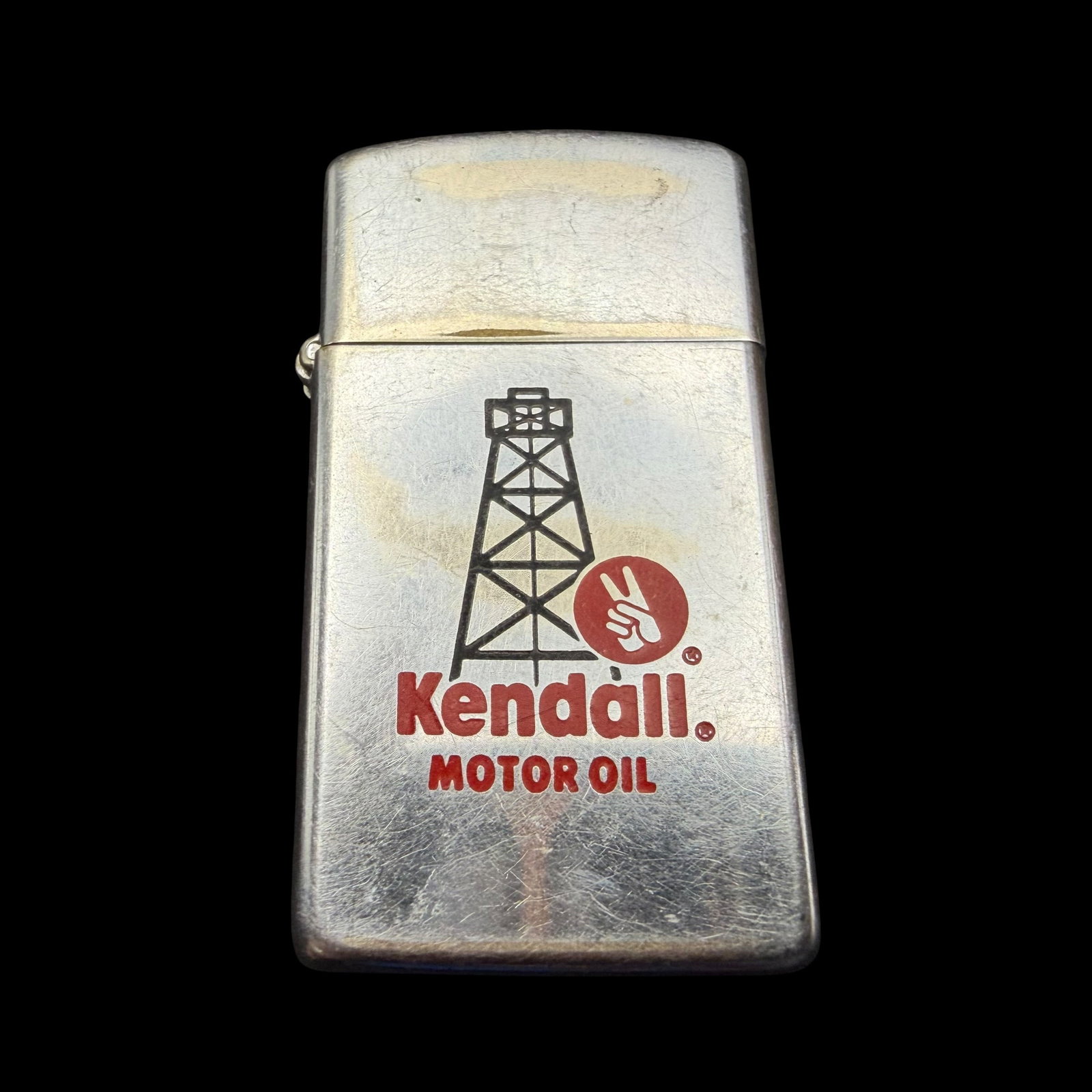 Vintage 1985 Kendall Motor Oils Zippo Slim Pocket Lighter: Maker: Zippo. / Material: I believe it is brushed steel. / Size: 2 1/4” x 1 1/4”. / Condition: Great, ready to enjoy! Some honest use wear. Untested. / Sold as is. Measurements are approxi