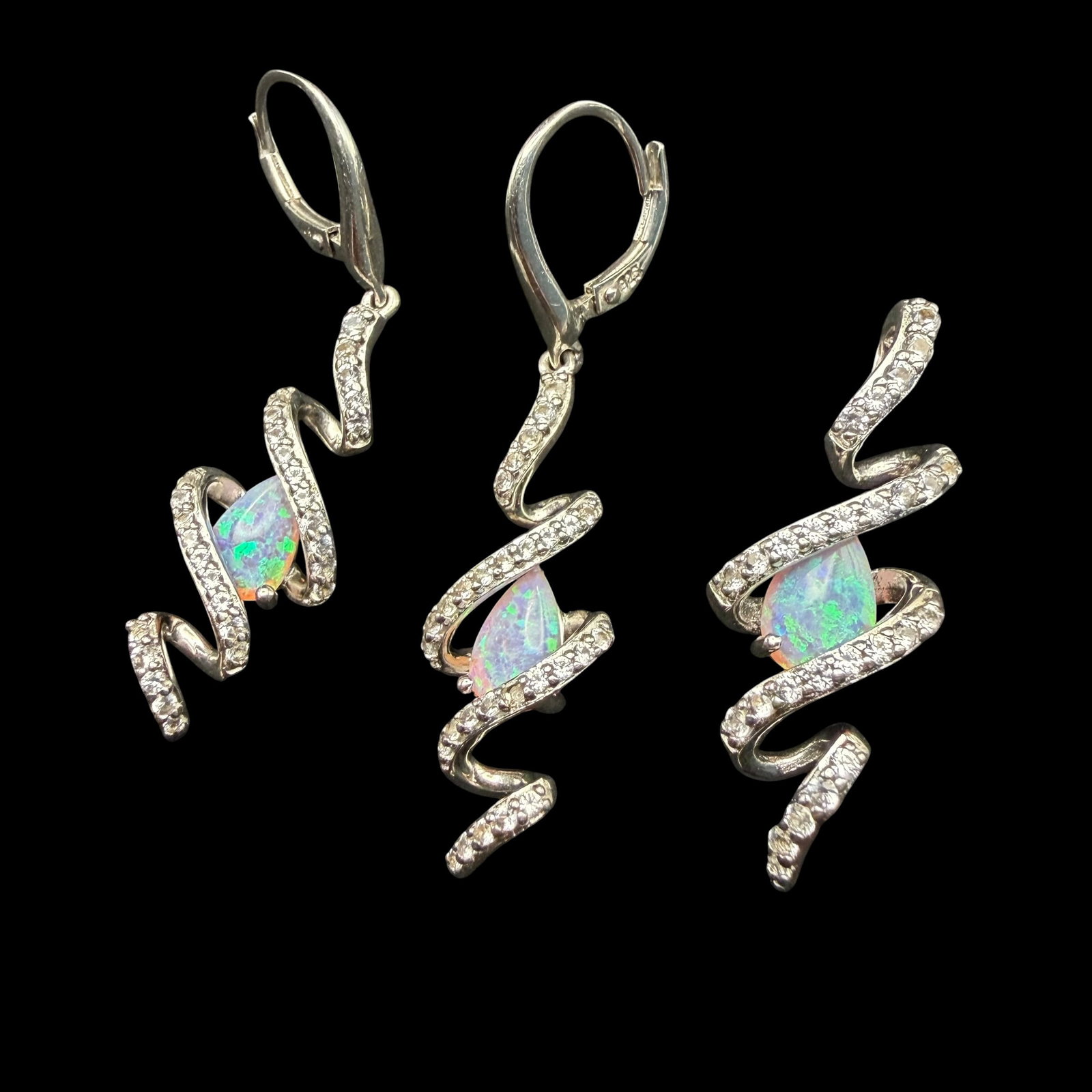 Vintage Sterling Silver Opal Twist Earrings & Necklace Pendant Signed 7.10g 925: Maker: Marked, unknown. / Material: Sterling Silver. / Stone: Opal. / Size: Each appx 1 1/4” long. / Weight: 7.10 grams combined. / Condition: Great, ready to enjoy! / Sold as is. Measurements a