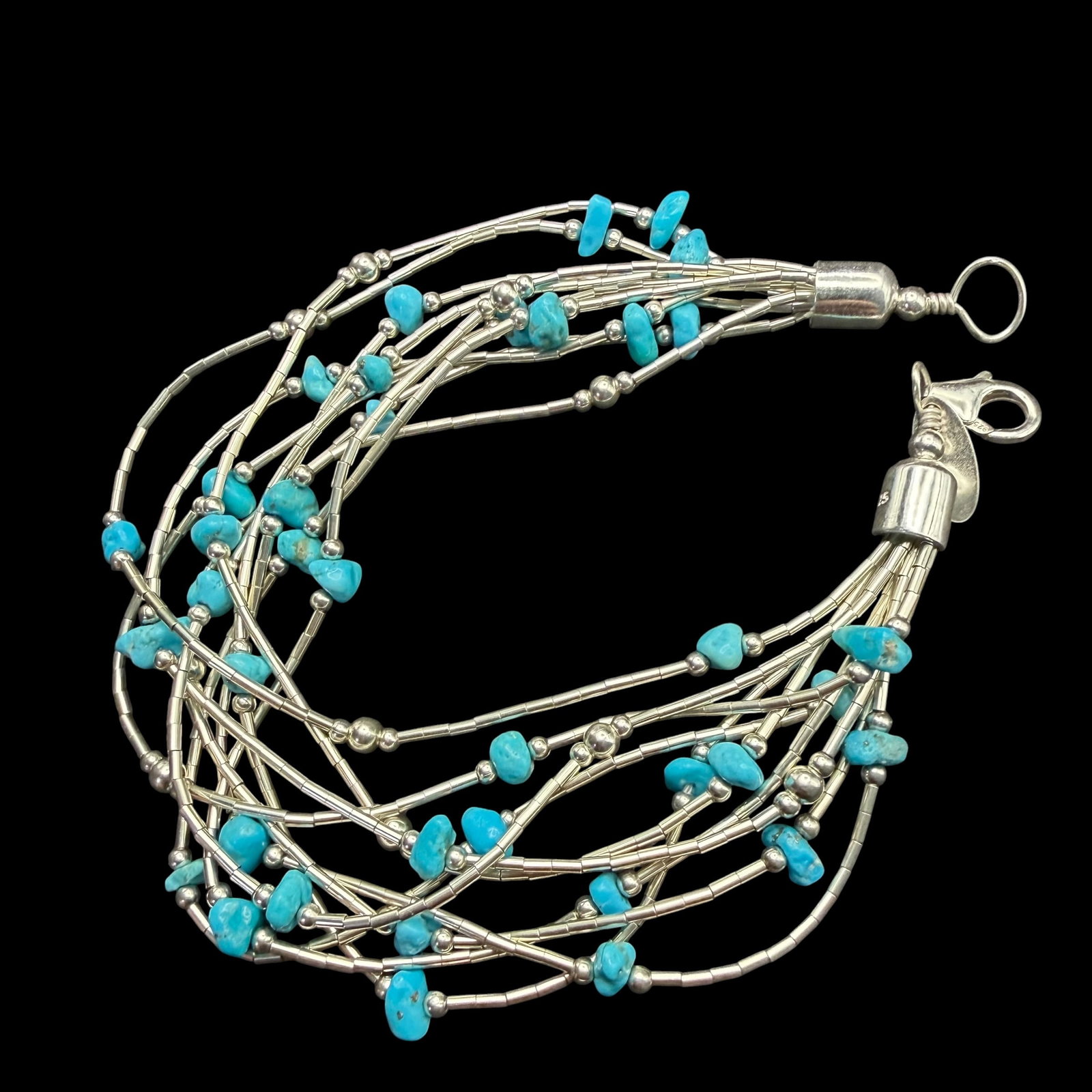 Vintage Sterling Silver Liquid Bead Turquoise 10 Strand Bracelet 8” 12.74g 925: Maker: Marked as shown. / Material: Sterling Silver. / Stone: Turquoise. / Size: 8” long overall. / Weight: 12.74 grams. / Condition: Great, ready to enjoy! / Sold as is. Measurements are approx