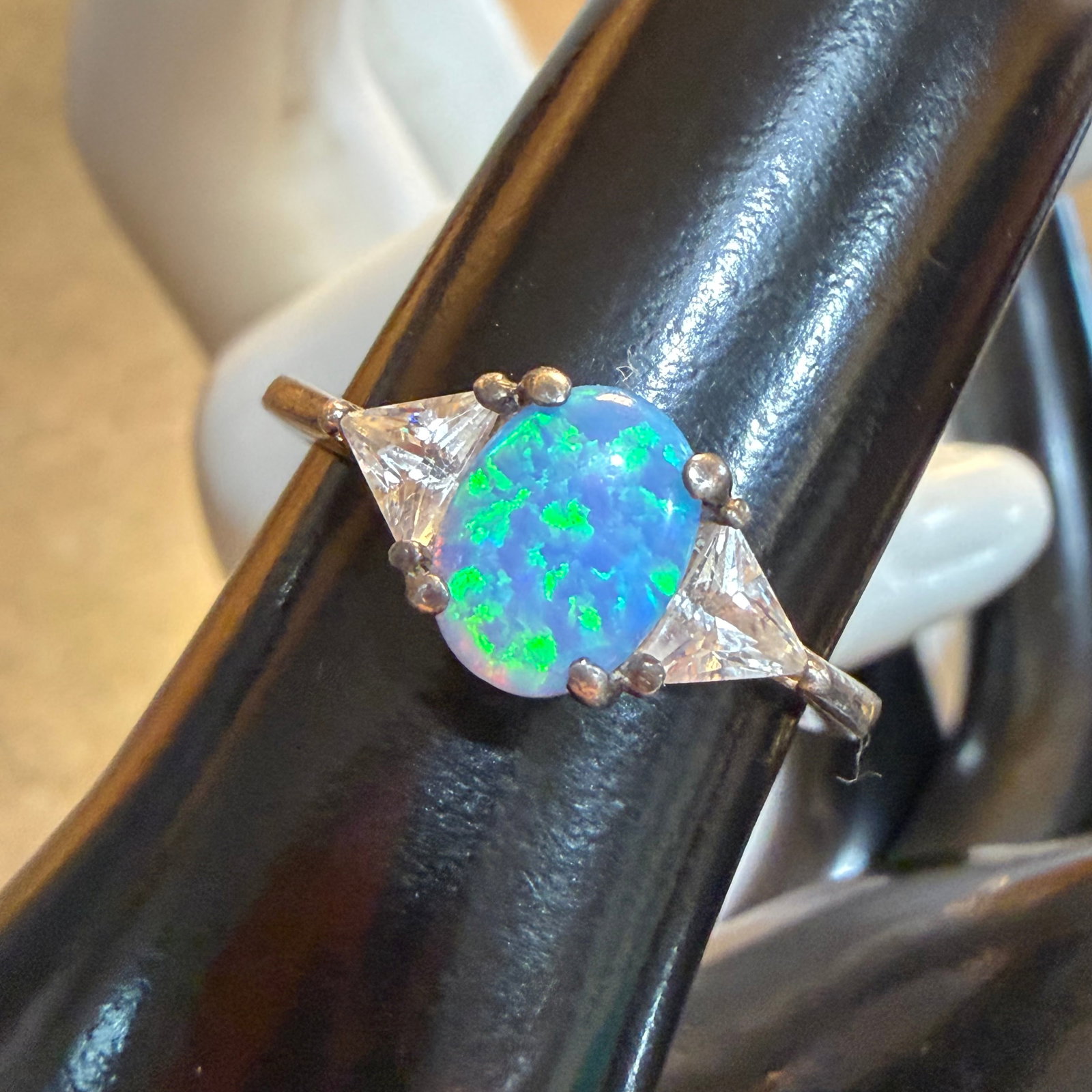 Vintage Avon Sterling Silver Opal CZ Ring Sz 6.25 2.39g 925: Maker: Avon. / Material: Sterling Silver. / Stone: Opal, possibly simulated and I believe CZ on sides. / Size: 6.25. / Weight: 2.39 grams. / Condition: Great, ready to enjoy! / Sold as is. Measurement