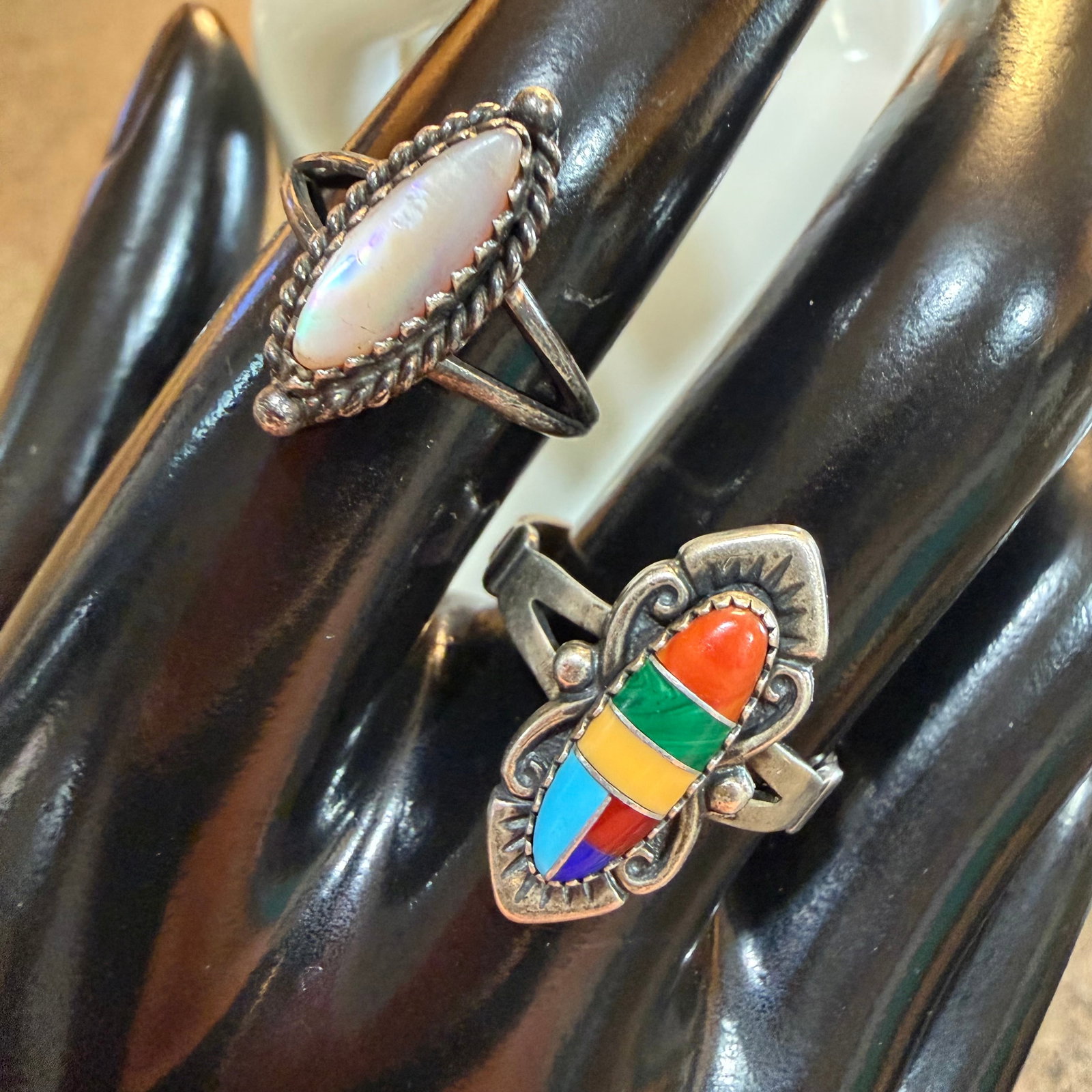 Native American Sterling Silver Rings MOP Old Pawn Sz 6.75 Inlays Wheeler Sz 9 5.41g 925 Vintage: Maker: Wheeler Co. and Old Pawn. / Material: Sterling Silver. / Stone: Inlays of Coral, Malachite, Turquoise, Coral. Mother of Pearl. / Size: Inlays 9, MOP 6.75. / Weight: 5.41 grams combined. / Condi