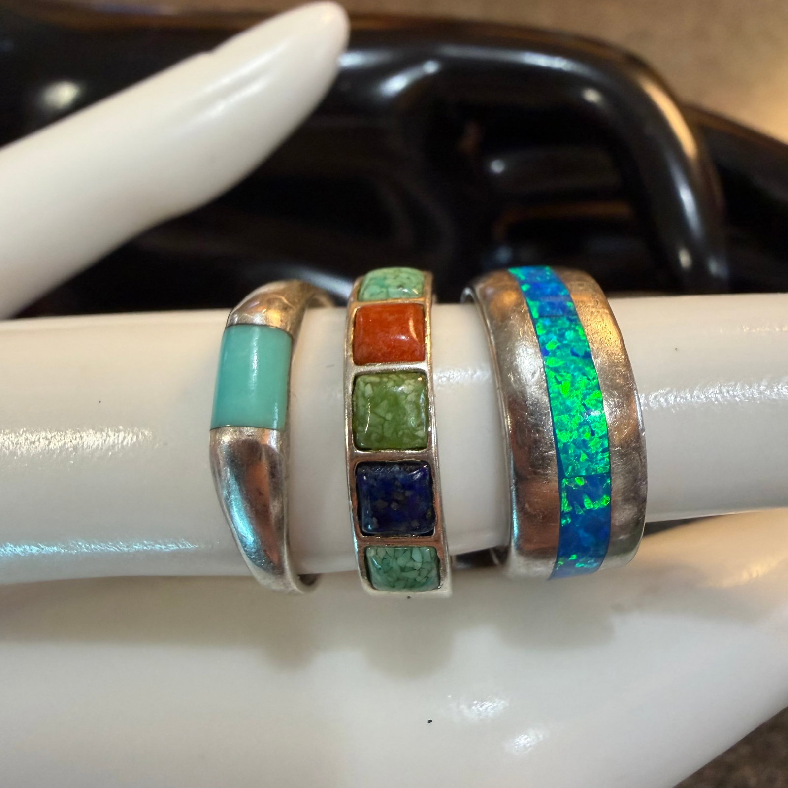 3 Vintage Sterling Silver Rings Turquoise Lapis Coral Opal Sz 5.25 6.25 7 10.22g 925 Native American: Maker: Unknown. / Material: Sterling Silver. / Stone: Turquoise. Turquoise, Lapis, Coral. Fire Blue Opal (unsure if natural). / Size: As shown, 5.24, 6.25, 7. / Weight: 10.22 grams combined. / Conditi