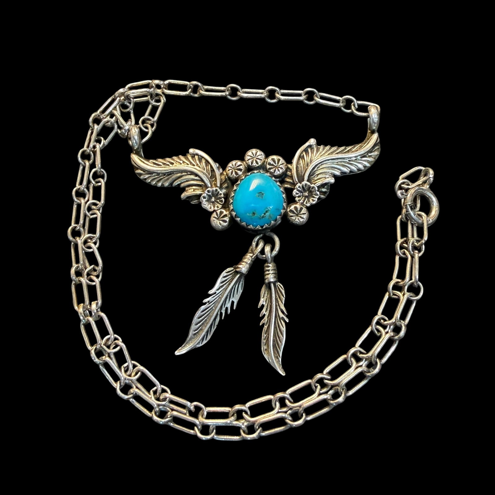 Vintage Native American Sterling Silver Turquoise Feather Pendant Necklace 15.5” 9.71g 925: Maker: Unsigned. / Material: Sterling Silver. / Stone: Turquoise. / Size: 15 1/2” long overall. Top to bottom of feather 8 1/2” when laid straight. / Weight: 9.76 grams. / Condition: Great