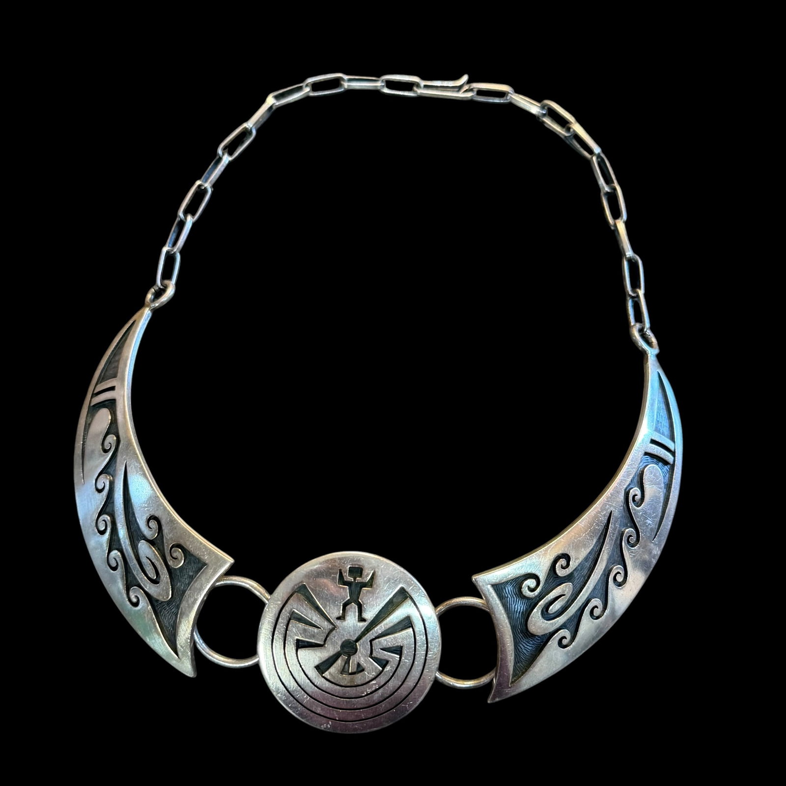 Vintage Sterling Silver Hopi Necklace George Phillips 14.5” 57.86g 925: Maker: George Phillips, Hopi. / Material: Sterling Silver. / Stone: None. / Size: 14 1/2” long. Center medallion 1 3/8” diameter. / Weight: 57.86 grams. / Condition: Great, ready to enjoy.