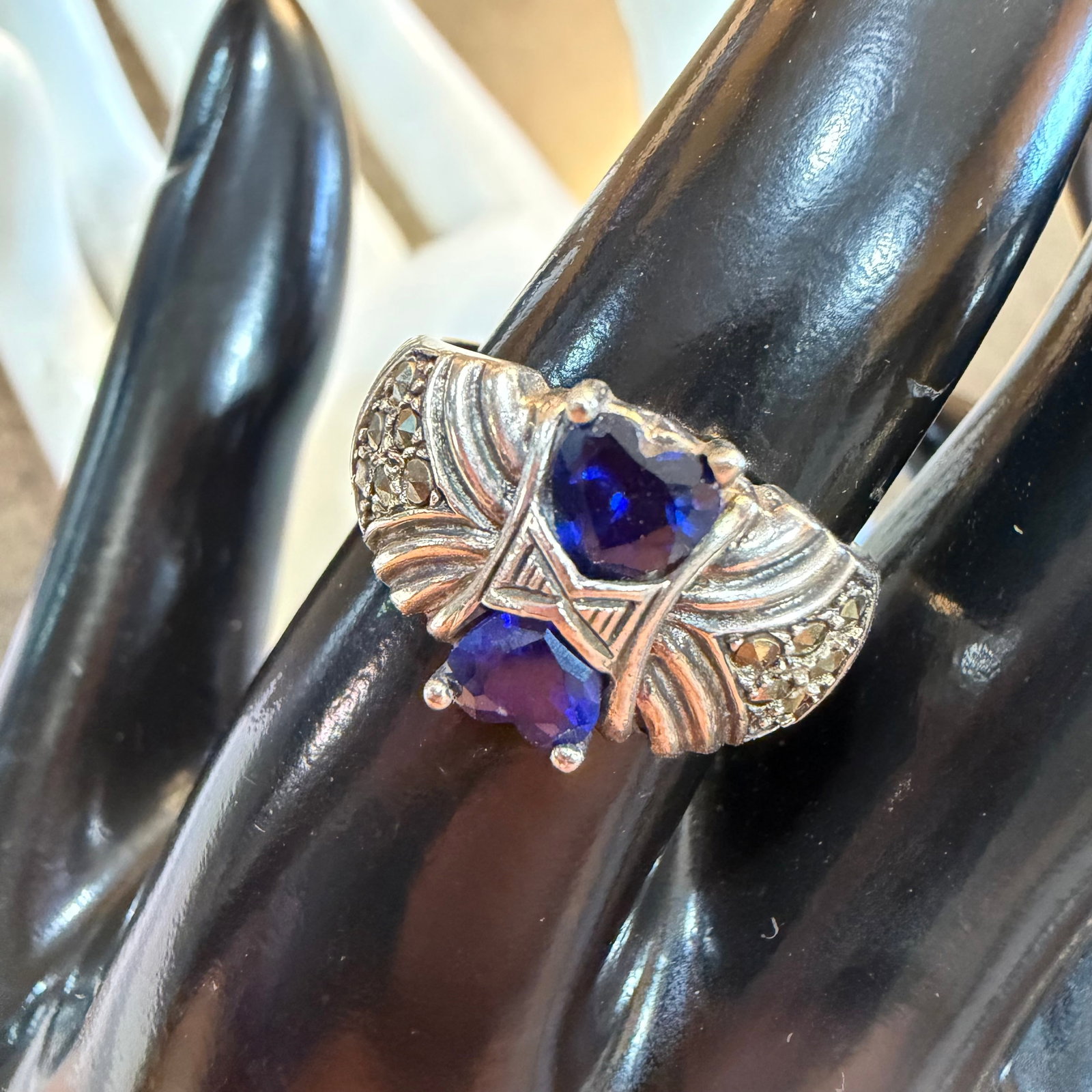 Vintage Sterling Silver Blue Hearts Marcasite Ring Sz 8.5 4.55g 925: Maker: Unsigned, unknown. / Material: Sterling Silver. / Stone: Blue stones and marcasite. / Size: 8.5. Face measures 1/2” wide. / Weight: 4.55 grams. / Condition: Great, ready to be enjoyed. / 