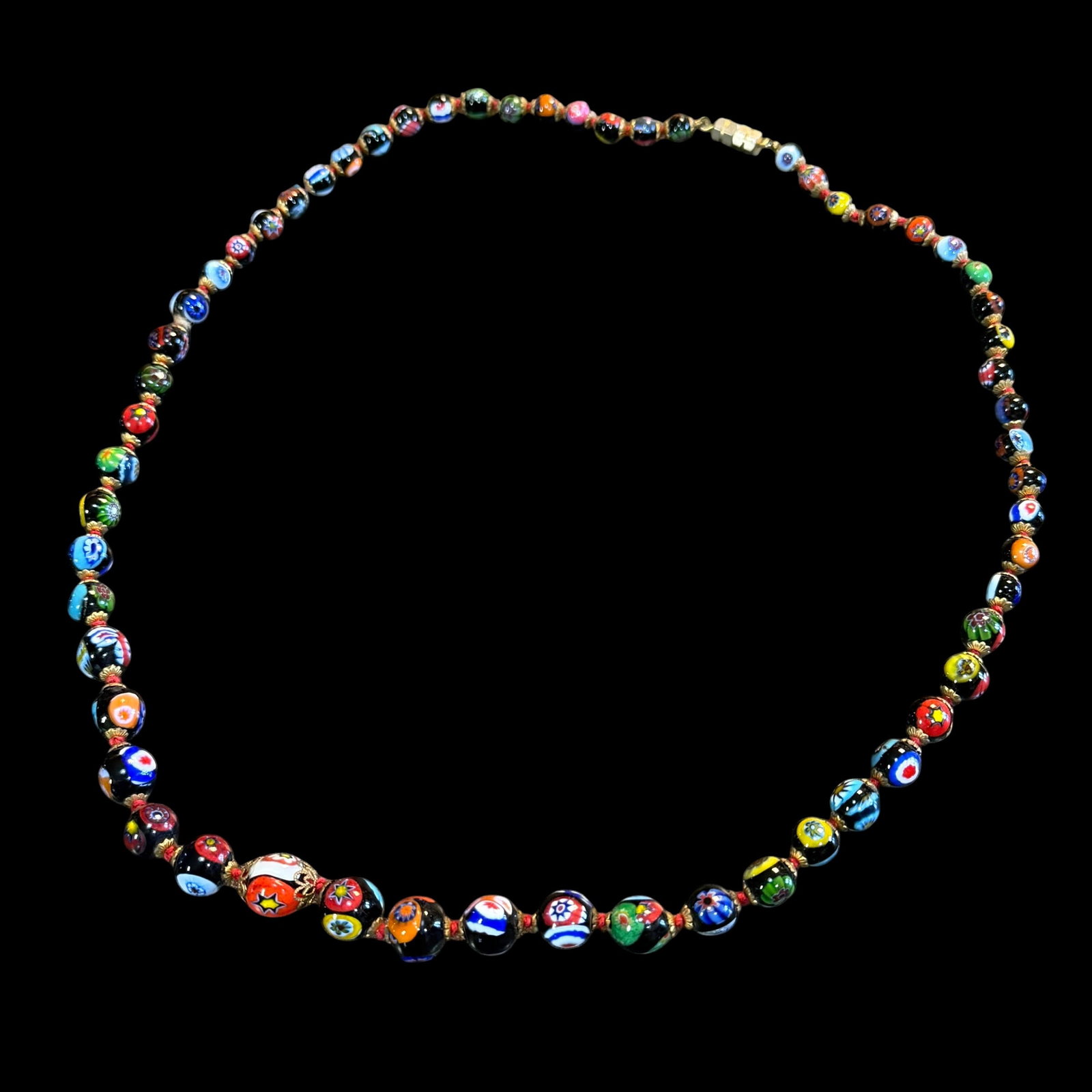 Vintage Millefiori Murano Venetian Italian Glass Bead Necklace 24” Long: Maker: Murano likely. / Material: Glass beads, brass end. / Size: 24” long. / Condition: Great, ready to be enjoyed. / Sold as is. Measurements are approximate. Please see all photos as a part o