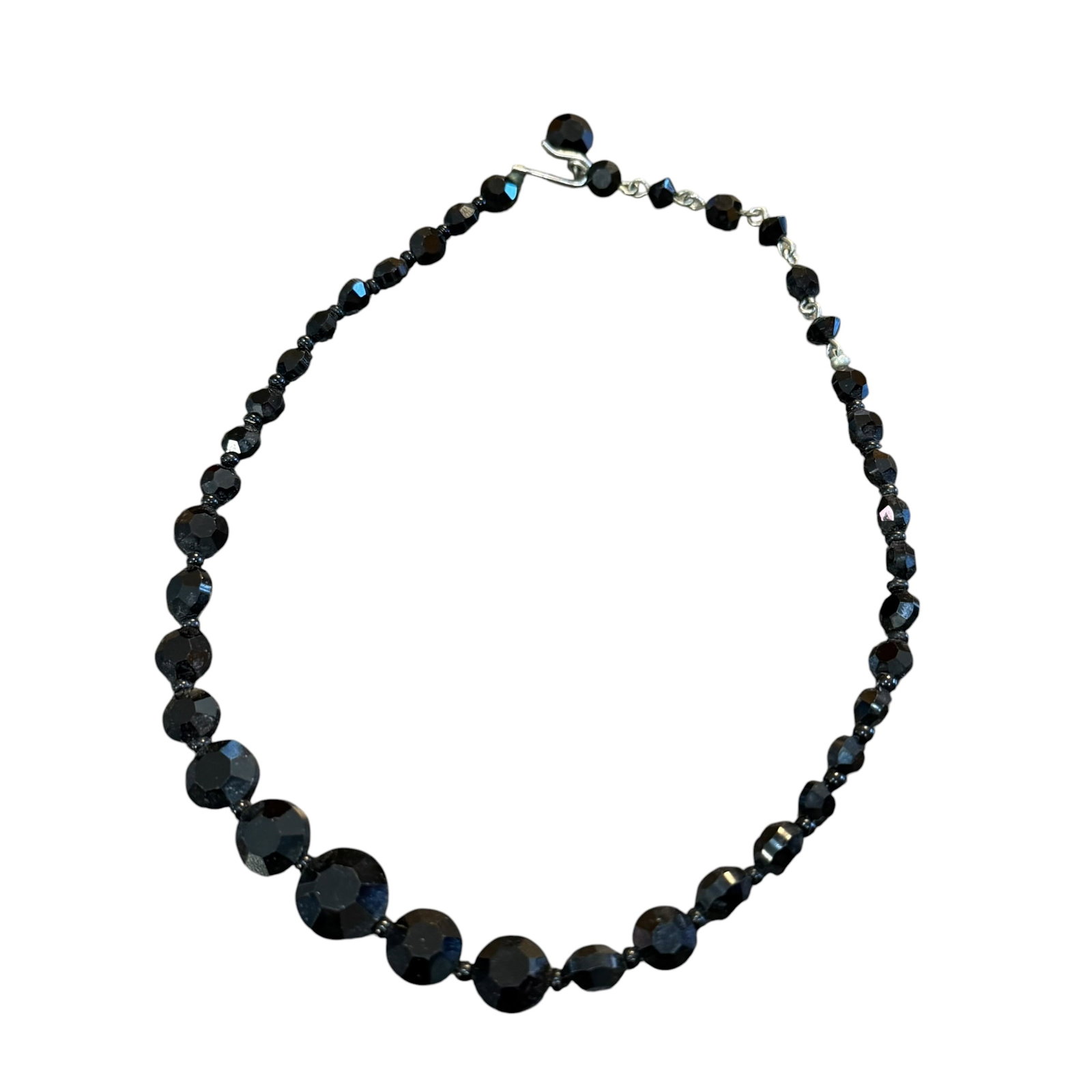 Vintage Black Glass Faceted Bead Necklace 14” Long: Maker: Unknown, unmarked. / Material: Glass beads. / Size: 14 inches long overall. / Condition: Great, ready to be enjoyed. / Sold as is. Measurements are approximate. Please see all photos as a part 