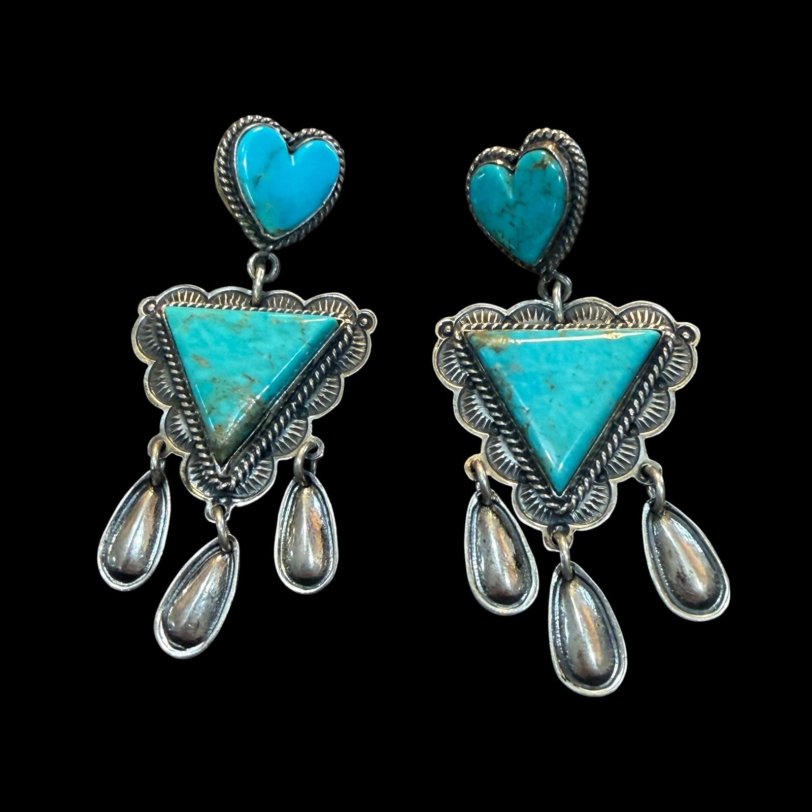 Vintage Native American Sterling Silver Turquoise Heart Dangle Earrings G. Reeves 2.5” 25.94g: Maker: G. Reeves. / Material: Sterling Silver. / Stone: Turquoise. / Size: 2 1/2” x 1 1 /8”. / Weight: 25.94 grams. / Condition: Great, ready to be enjoyed. / Sold as is. Measurements are 