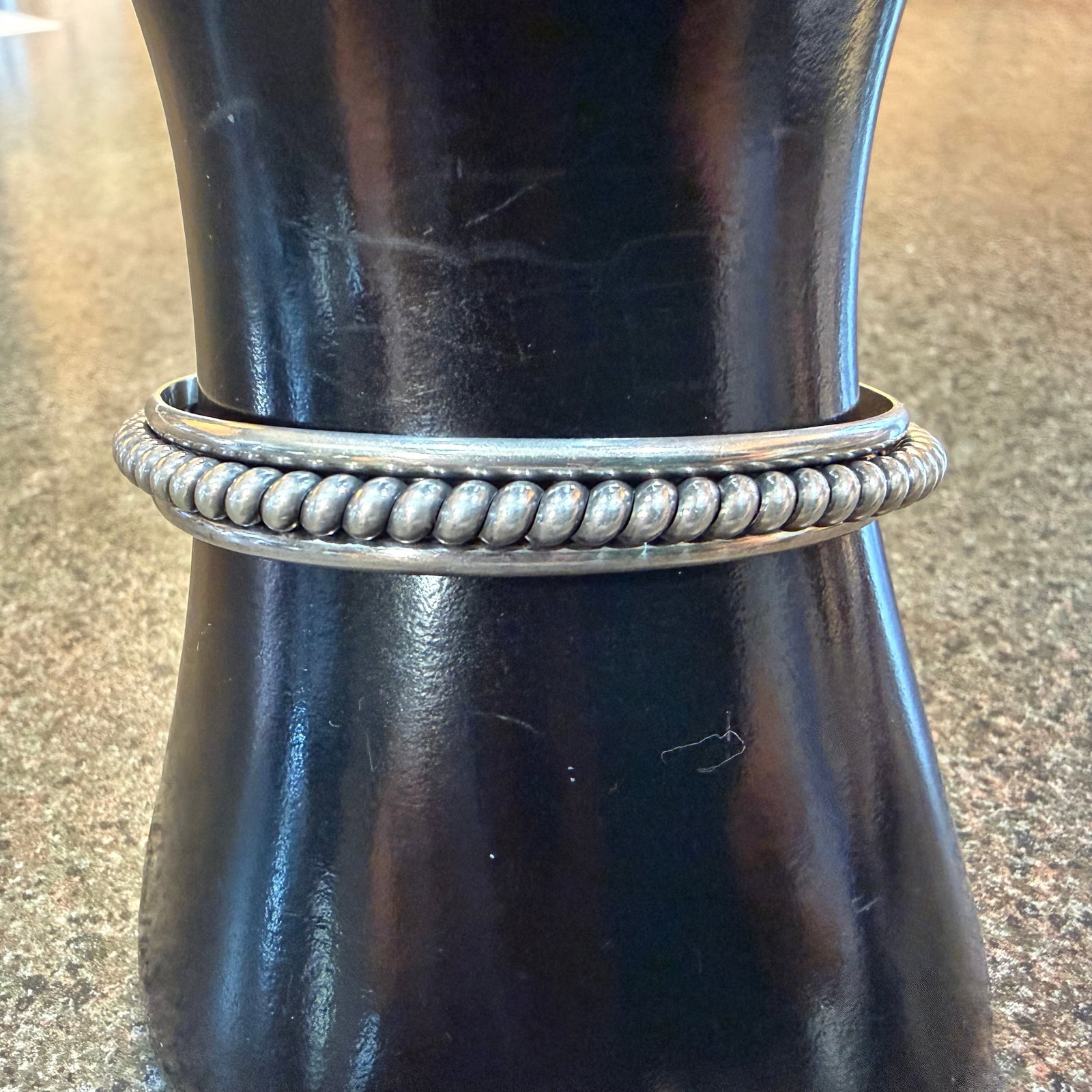 Vintage Sterling Silver Rope Southwestern Native American Style Cuff Bracelet 18.22g 925: Maker: Unmarked, unknown. / Material: Sterling Silver. / Stone: None. / Size: Opening 5.5 cm x 4.3 cm, with flex. Band is 5/16” wide. / Weight: 18.22 grams. / Condition: Great, ready to be enjoy