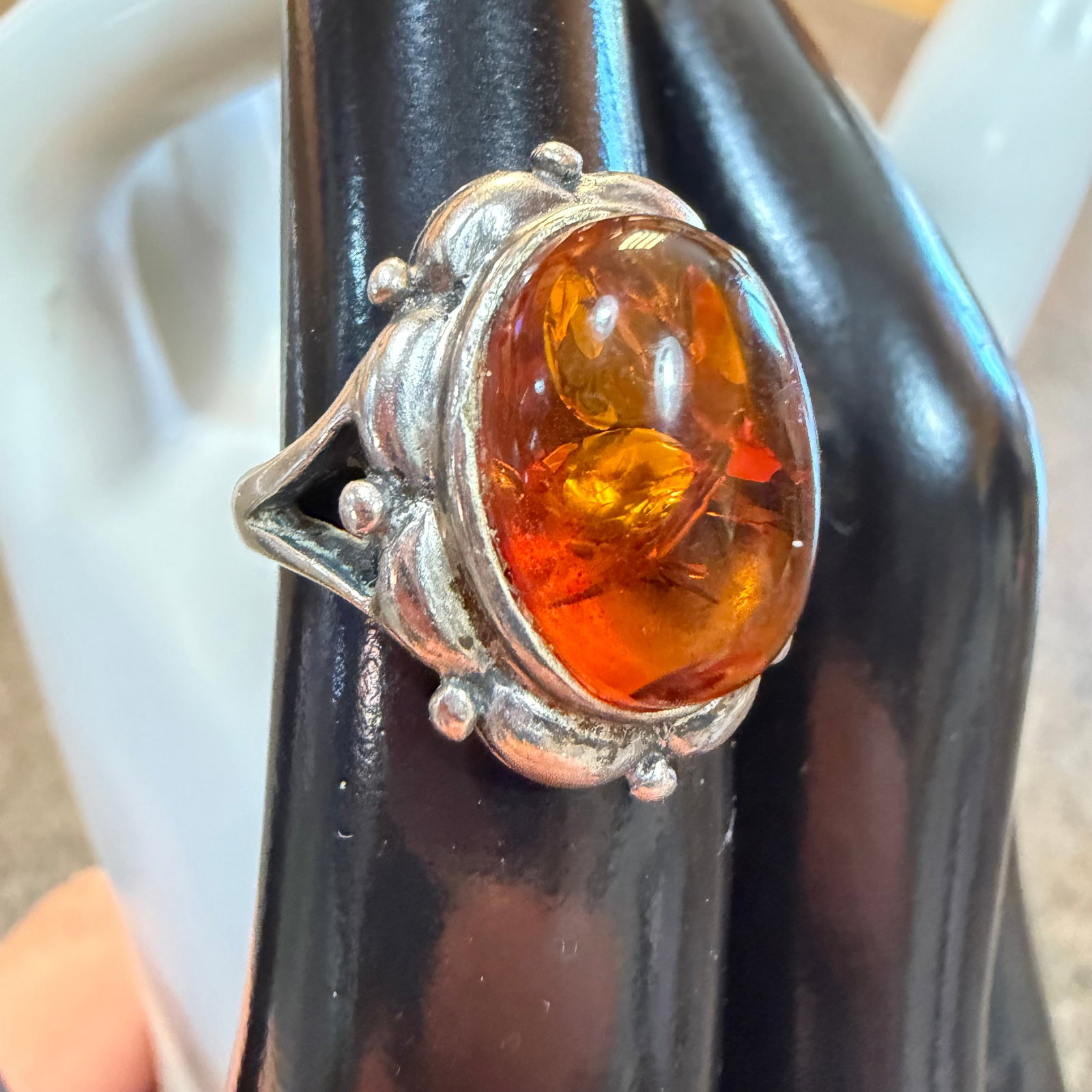 Vintage Sterling Silver Amber Victorian Art Deco Southwestern Style Ring Sz 5 4.86g 925 Signed: Maker: Signed as shown. Unknown. / Material: Sterling Silver. / Stone: Amber, unsure if natural. / Size: 5. Face measures 3/4” wide. / Weight: 4.86 grams. / Condition: Great, ready to be enjoyed