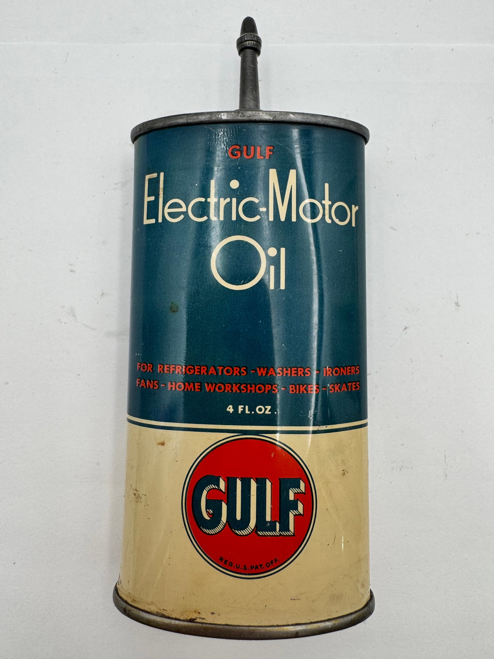 Vintage Gulf Electric Motor Oil Handy Oiler Can 4oz: Vintage Gulf Electric-Motor Oil handy oiler can featuring beautiful blue, cream, and red Gulf graphics with original long spout applicator. This early household and workshop lubricant can was made for