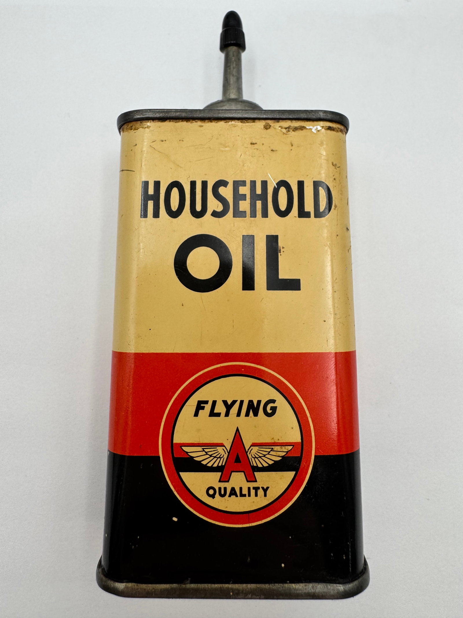 Vintage Flying A Household Oil Can Tide Water Associated Oil: Vintage Flying A Household Oil lubricating can featuring striking cream, red, and black graphics with the iconic winged “A” Flying A Quality logo. This attractive rectangular oil can includes 