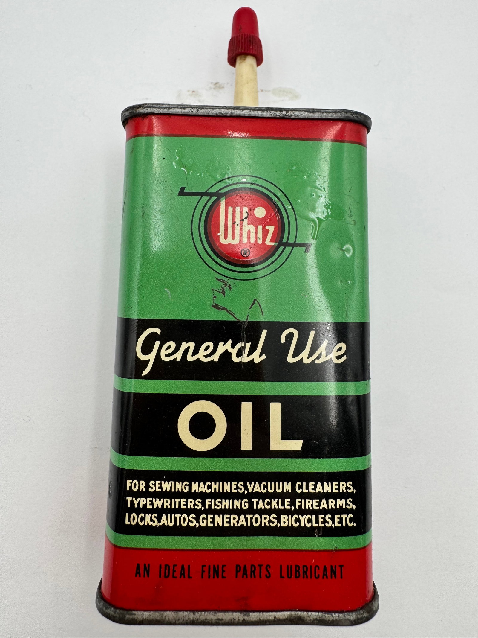 Vintage Whiz General Use Oil Tin Oiler Can R.M. Hollingshead: Original vintage Whiz General Use Oil advertising tin oiler can featuring bold green, red, black, and cream graphics with original plastic spout and red cap. Manufactured by R.M. Hollingshead Corp., t