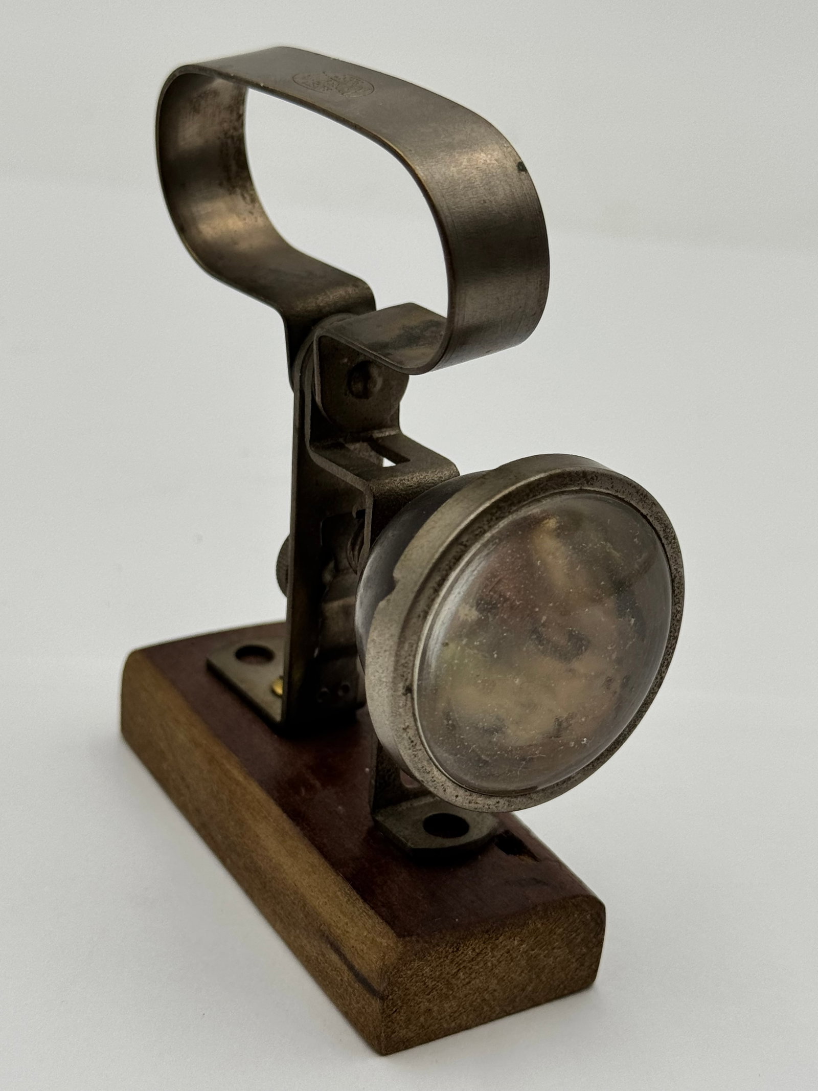 Antique Safety Redsealite Railroad Caboose Signal Lamp Bracket Light on Wood Base: Unique antique industrial or railroad-related signal light marked “Safety Redsealite First.” Mounted on a custom wood display base, this piece features a heavy metal bracket with integrated ro
