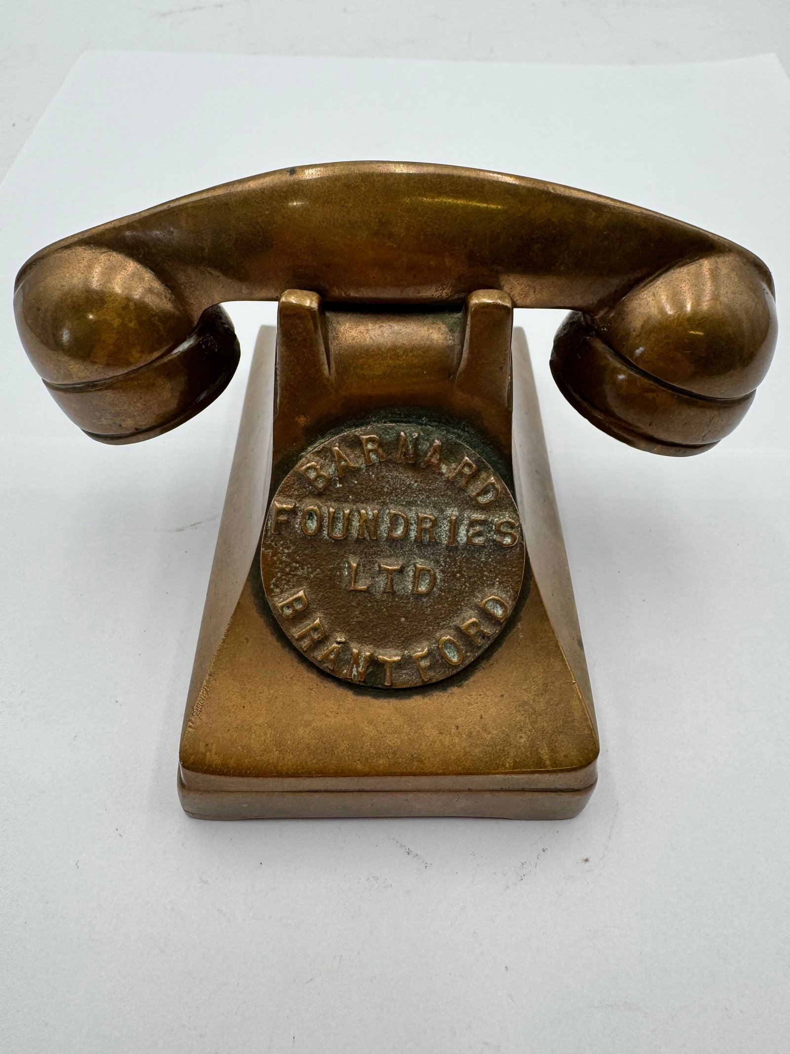 Vintage Barnard Foundries Brantford Bronze Telephone Paperweight Canada: Vintage bronze telephone paperweight made by Barnard Foundries Ltd. of Brantford, Ontario, Canada. Features a detailed old-fashioned telephone design with solid heavy construction and rich aged