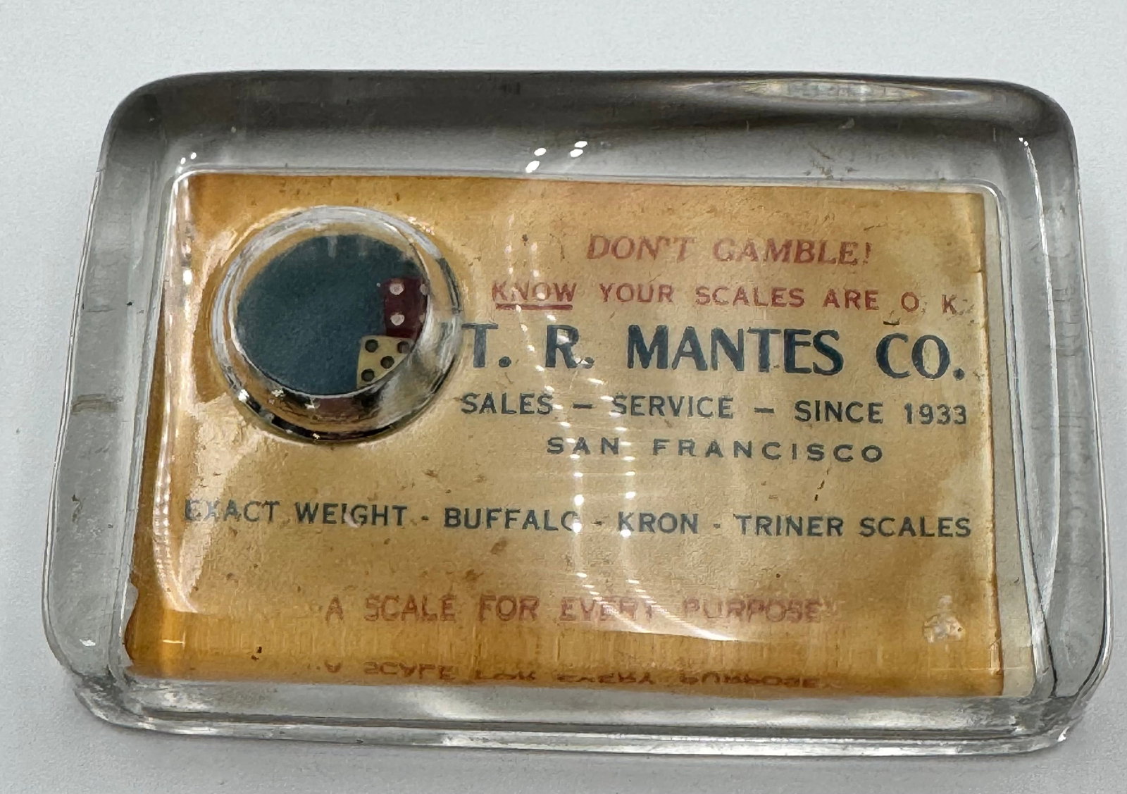 Vintage Gambling Theme T.R. Mantes Co Glass Advertising Paperweight w Dice Bubble: Rare vintage glass advertising paperweight featuring floating dice bubble design and mirrored back. Advertising piece for T.R. Mantes Co. of San Francisco, specialists in scale sales and service since