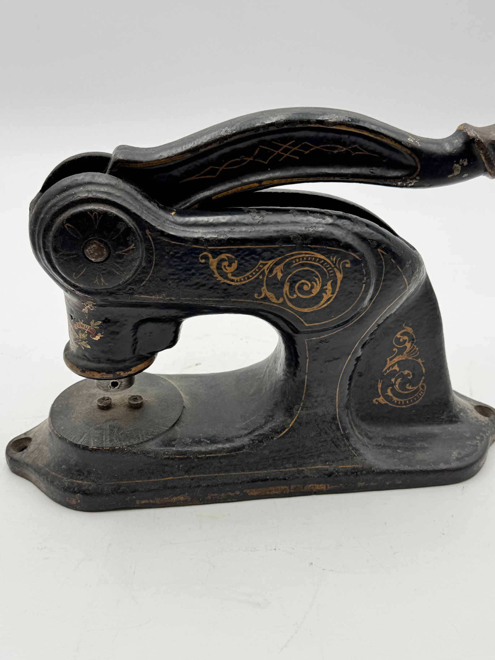 Antique Victorian Cast Iron “Pluribus” Seal Press Embosser Desk Stamp: Antique cast iron desk seal press/embosser with ornate Victorian scrollwork and original black painted finish with gold accents. Features partial “PLURIBUS” floral decal and decorative curved 